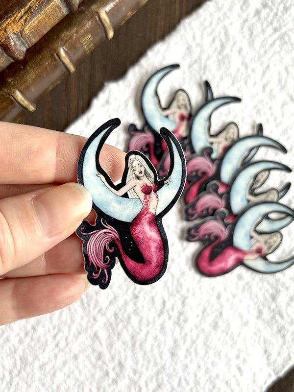isabelle.algrin.vinylsticker.moonmermaid.hold.jpg