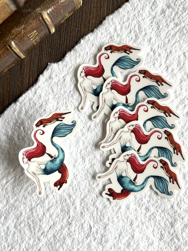 isabelle.algrin.vinylsticker.ottersmermaid.groupview.jpg