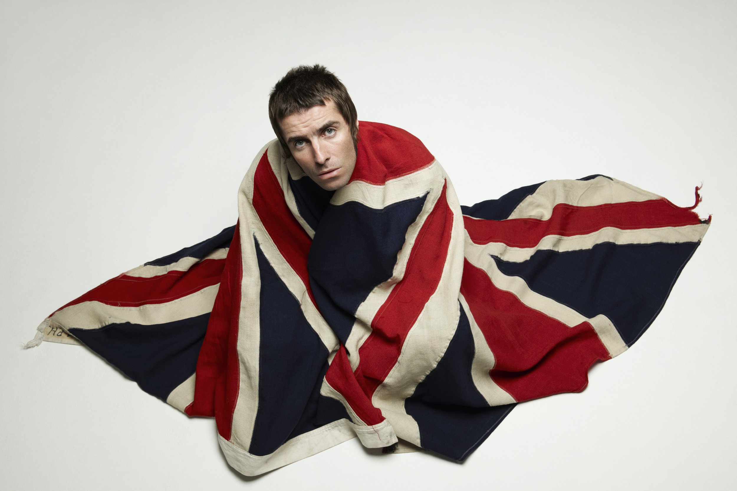 1. Liam Gallagher, Oasis in Union Jack, London, 2009 - Lawrence Watson, Print Matters.jpg