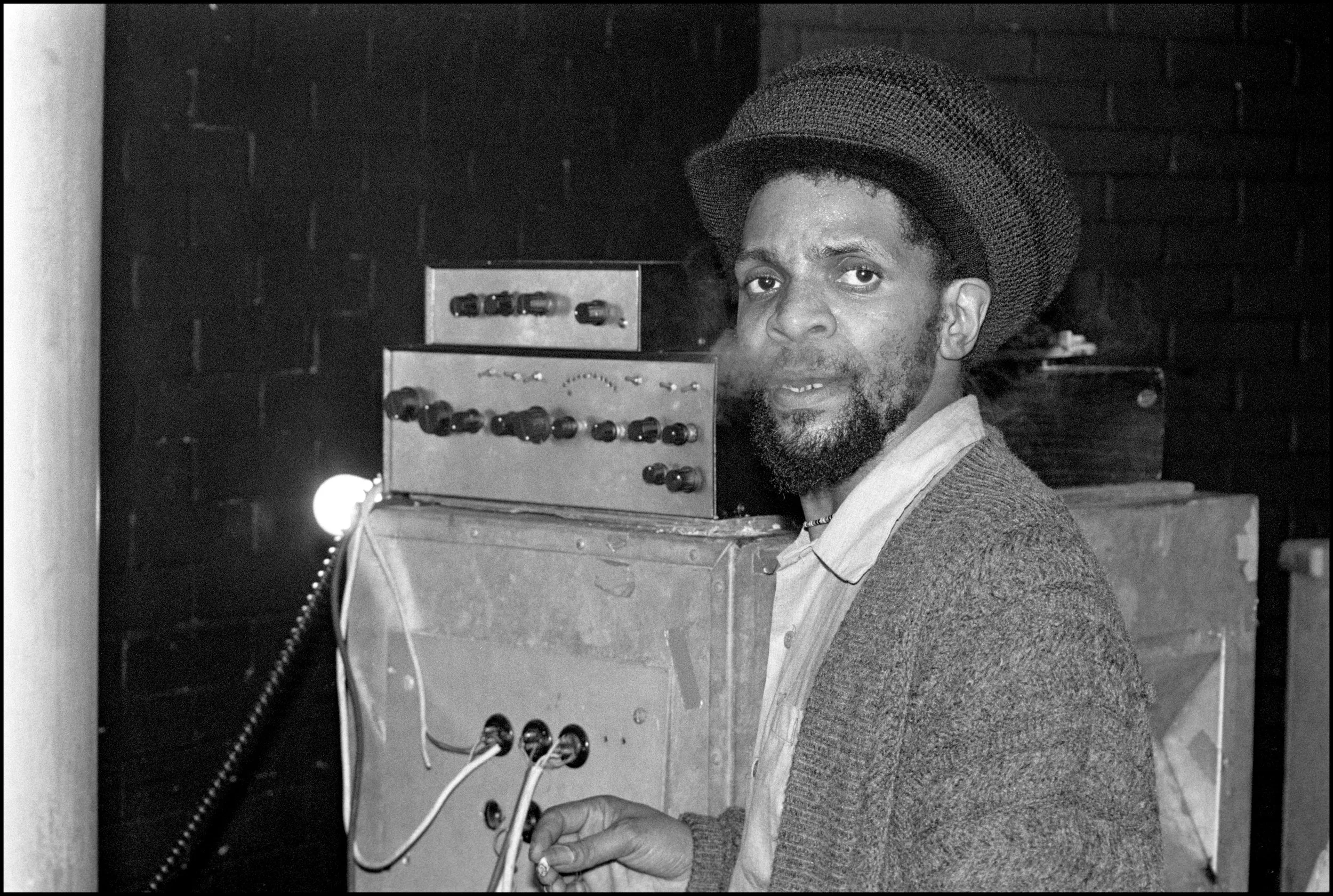 Jah Shaka with amplifiers at Albany Empire, Deptford, London, 7 February 1988.jpg