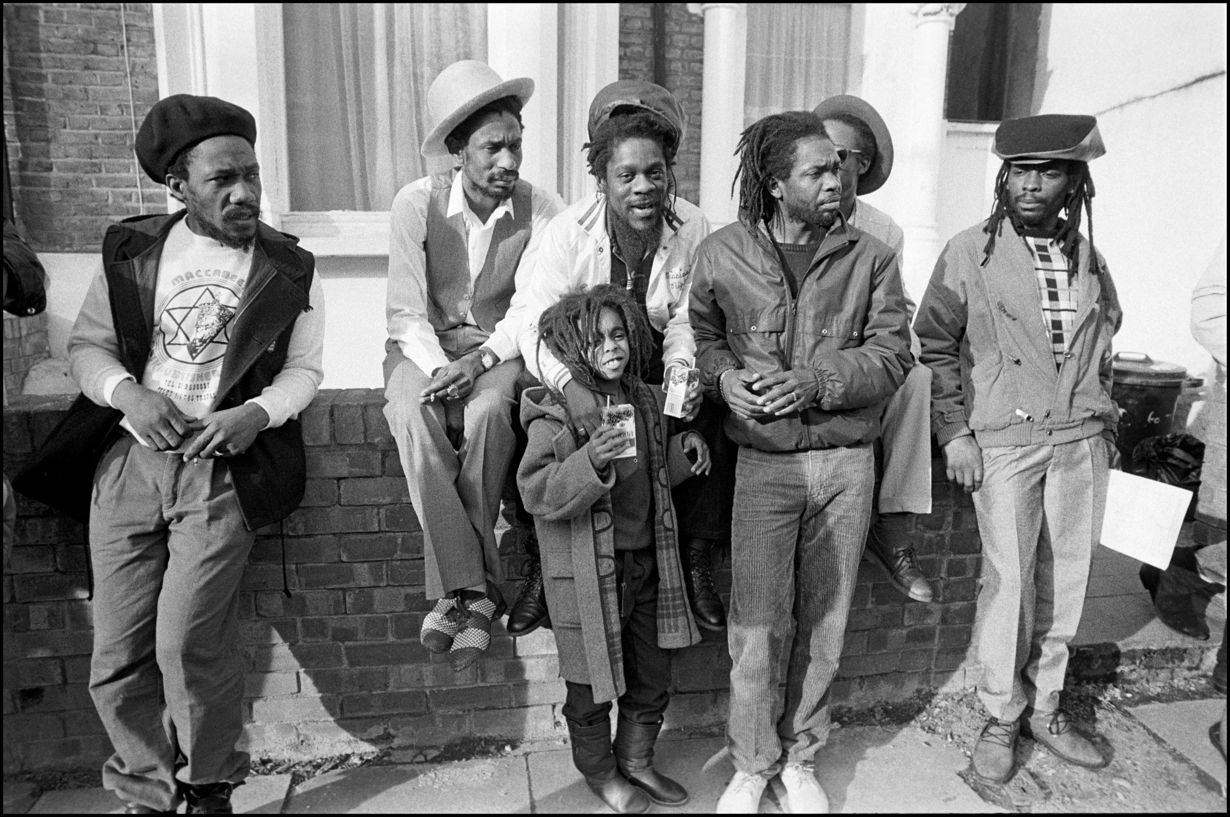 Dennis Brown, Mike Brooks etc at British Reggae Artists Famine Appeal (BRAFA) recording session outside Hive Recording Studios, Stoke Newington, London, 24 February 1985.jpg