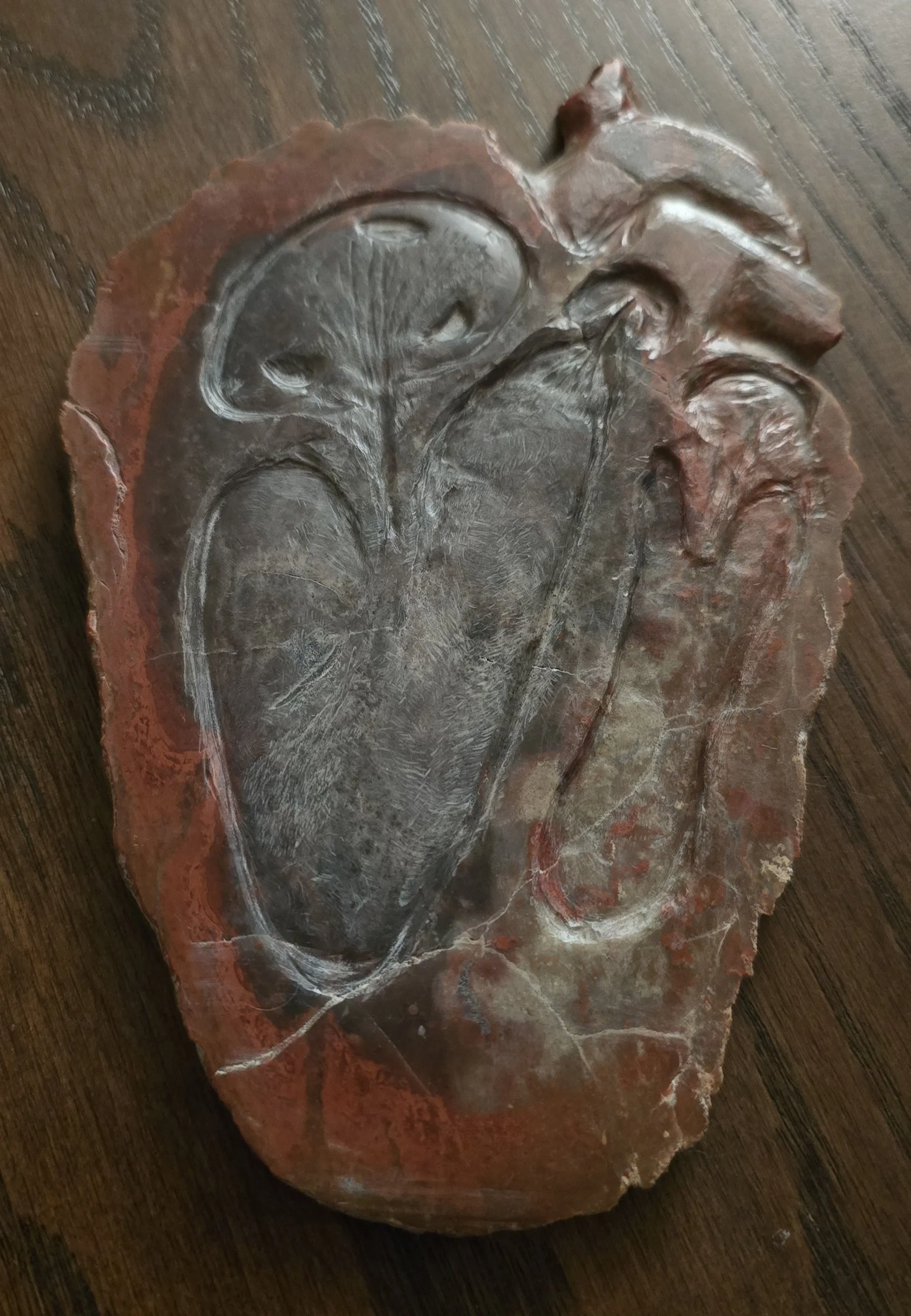 "Heart of Stone" (2025) Brecciated jasper cross section of a human heart, sculpted by Ryan Scarbrough.