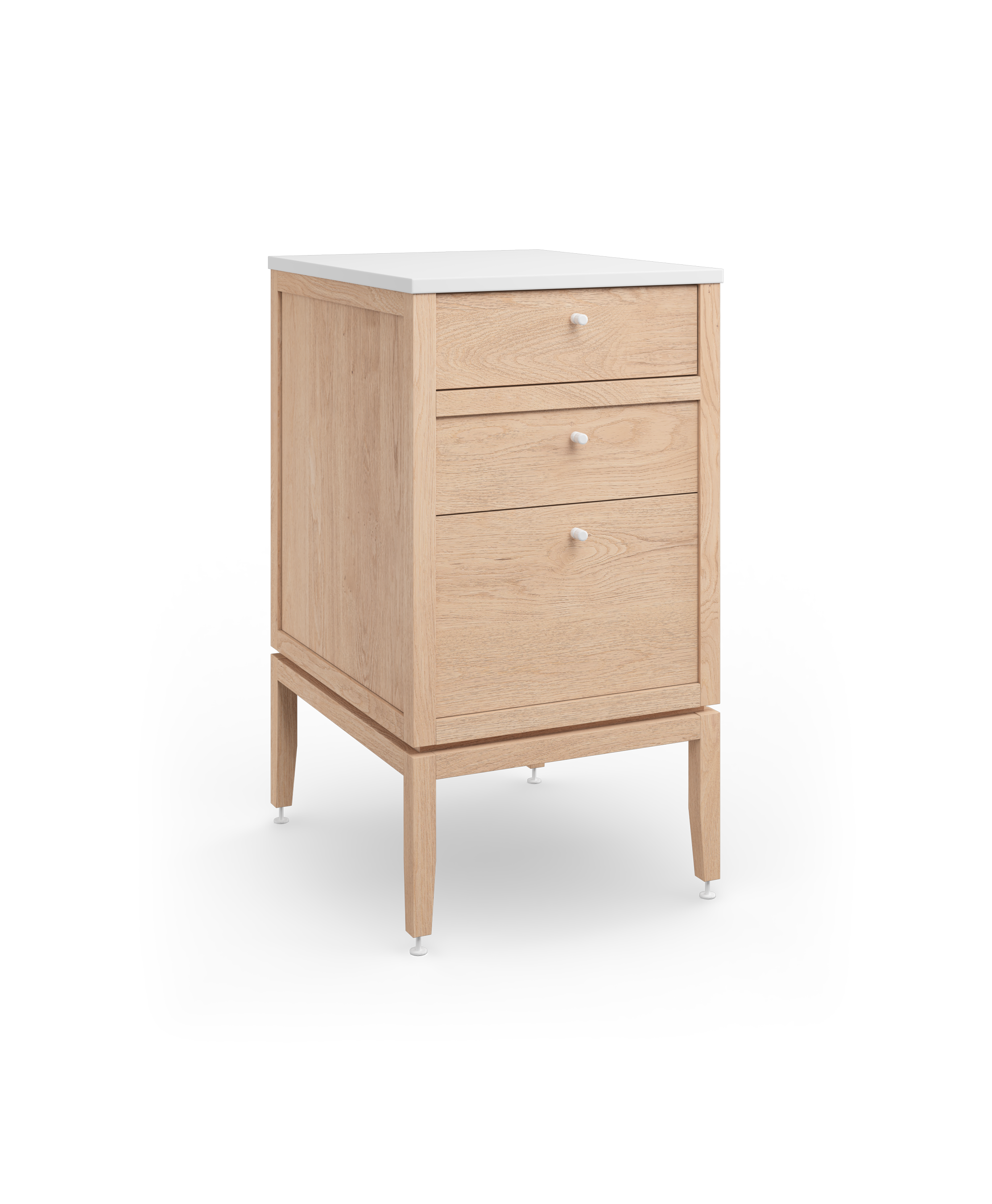 Vanité de salle de bain modulaire en chêne naturel, avec trois tiroirs et des poignées et pieds en métal blanc.