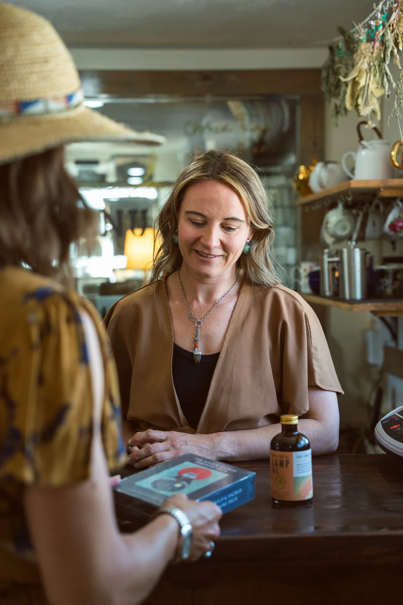 Founder and herbalist Amelia Hight at the Honorable Harvest apothecary counter.