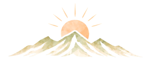 Sun rising behind snow-capped mountains.
