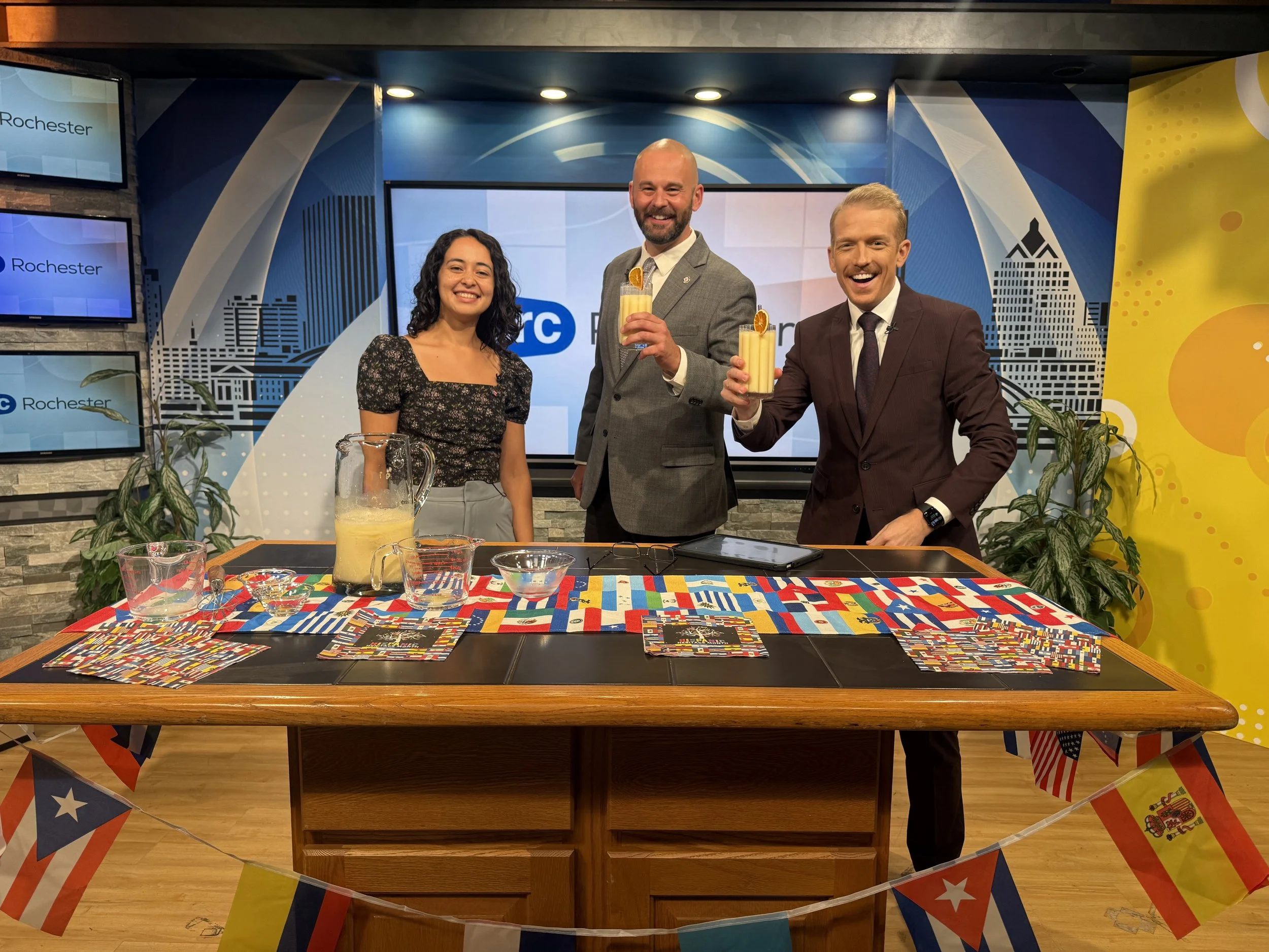 Isabel with two news anchors before filming a live news segment
