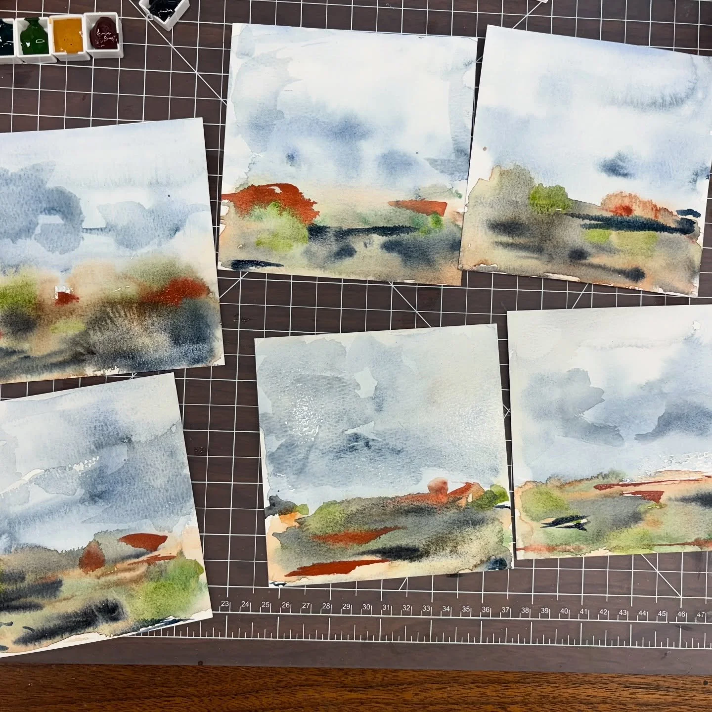 Repetition on theme with 6 abstract landscapes.