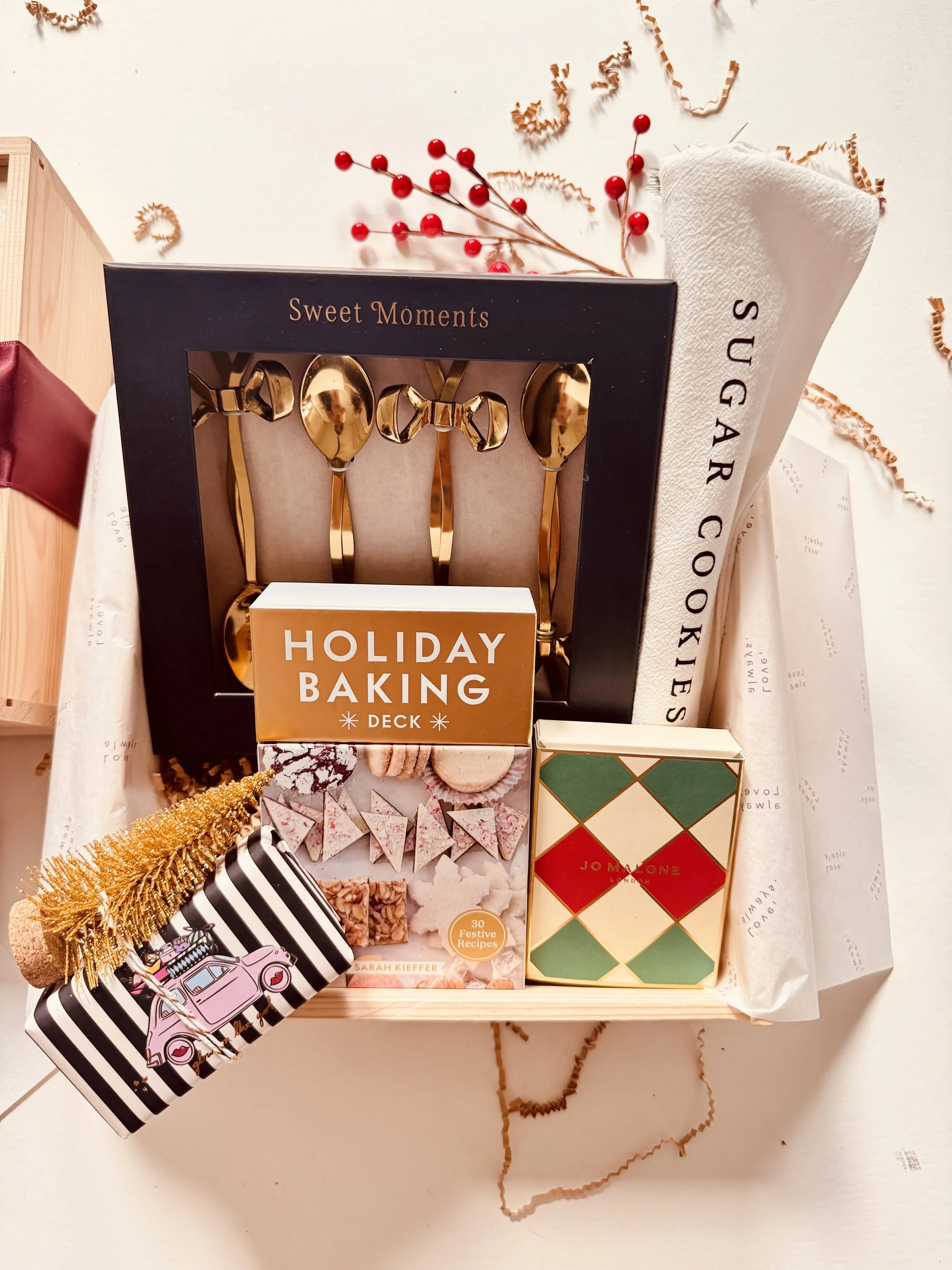 Luxury holiday gift box featuring gold teaspoons, holiday baking deck recipe cards, and seasonal packaging