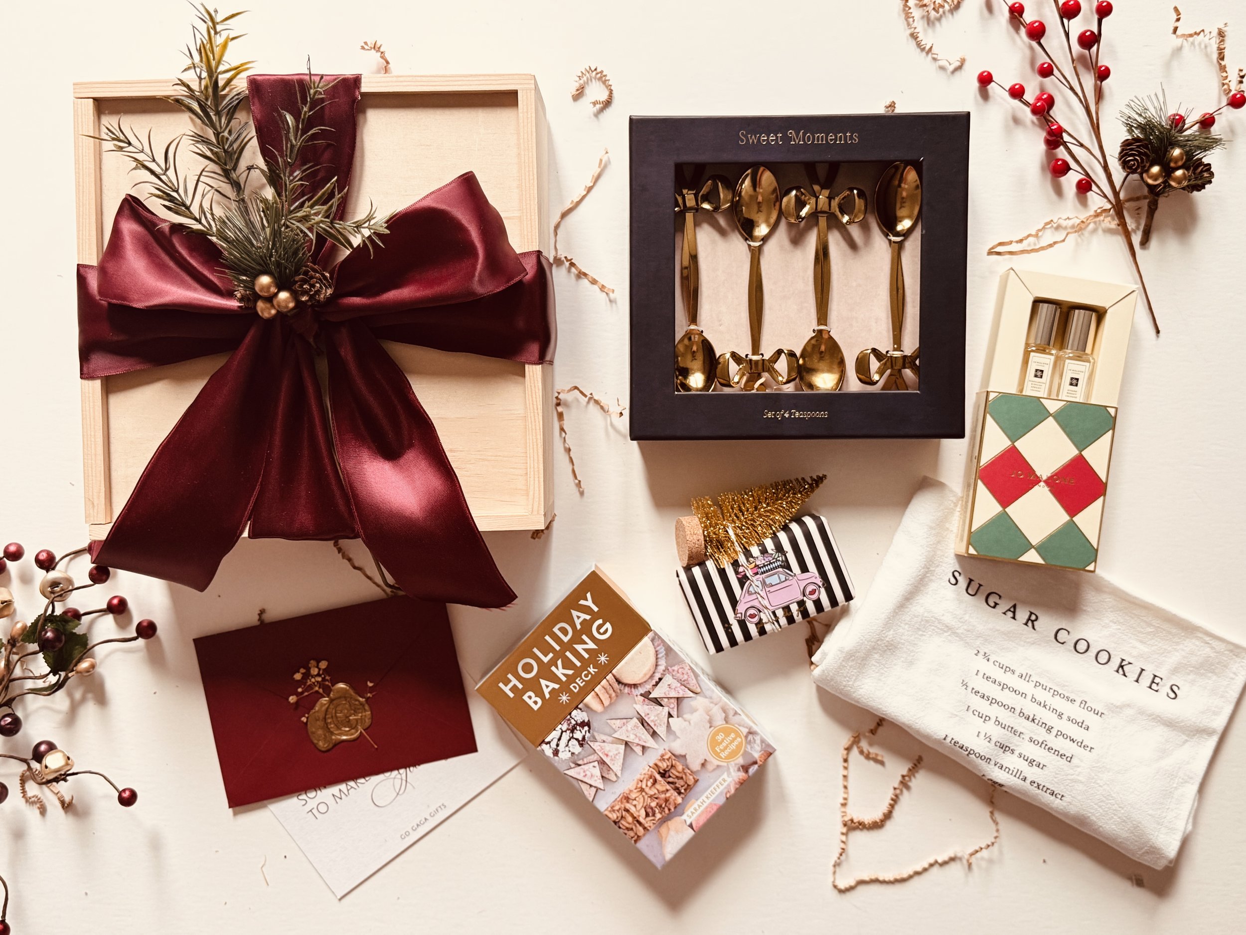Sweet Holiday Gift Box with Jo Malone fragrance, gold teaspoons, sugar cookies tea towel, recipe cards, and festive tree soap
