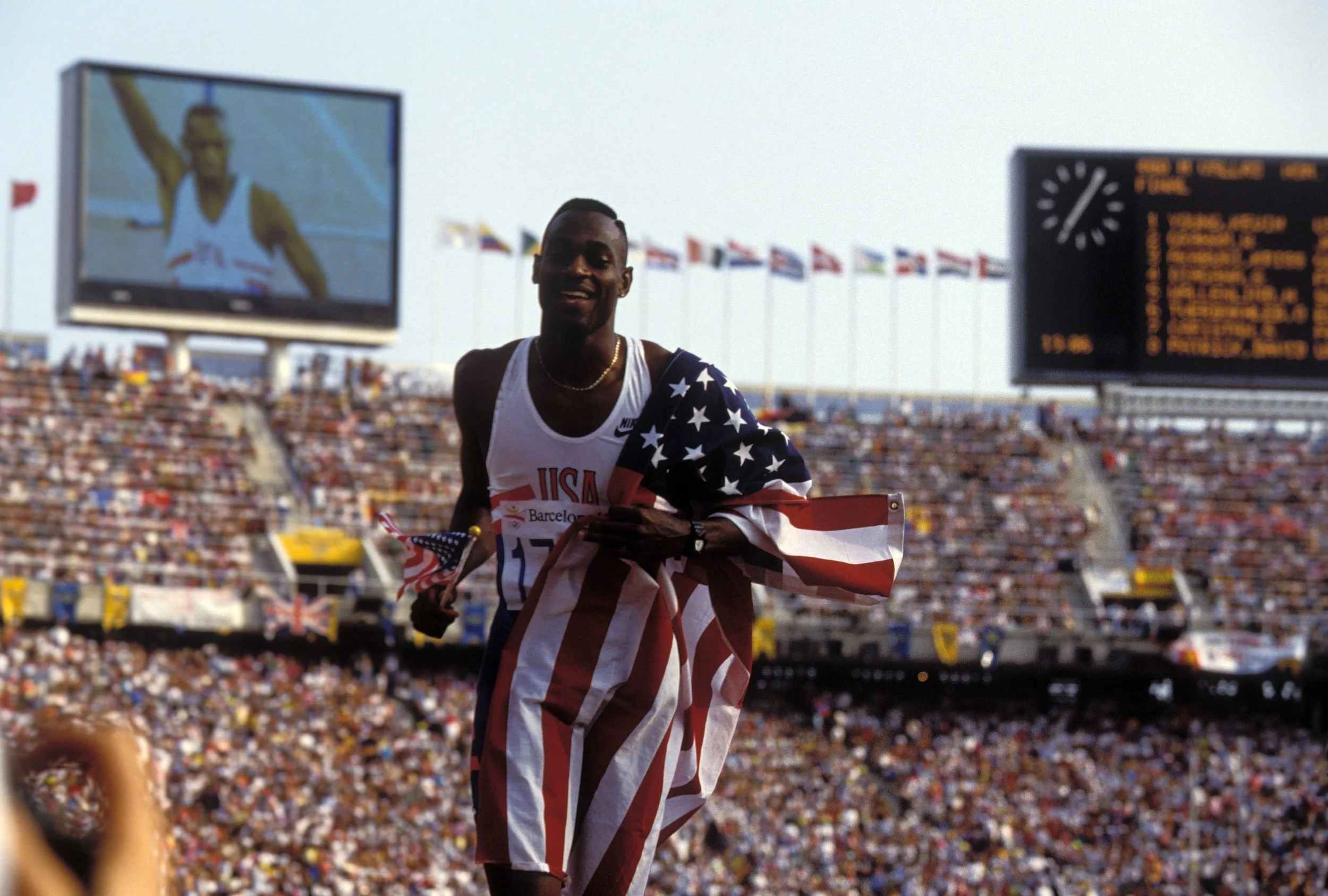 Kevin Young celebrating his Olympic triumph at the Summer Olympics 1992 in Barcelona, Spain