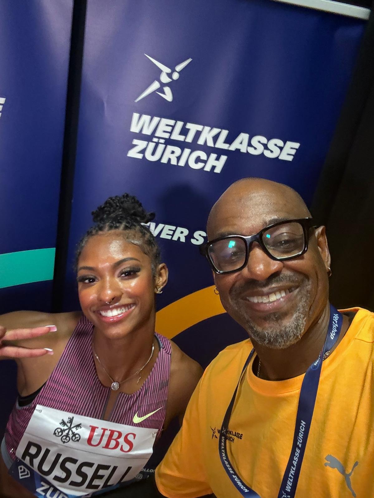 Kevin Young and Paris Olympic 100m hurdles champion Masai Russell