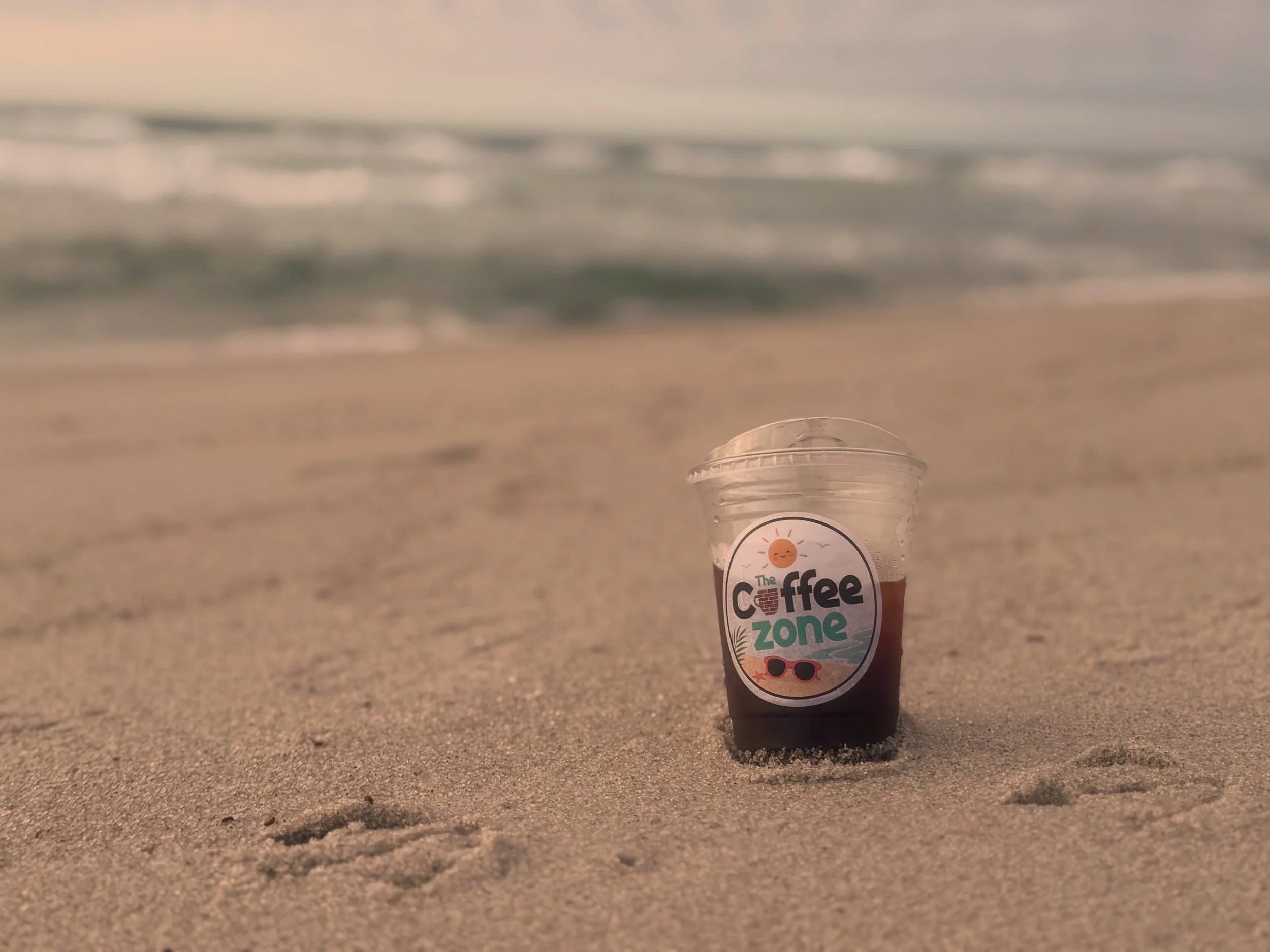 Just a @yellowdogroasters cold brew living its best beach life☀️☕️