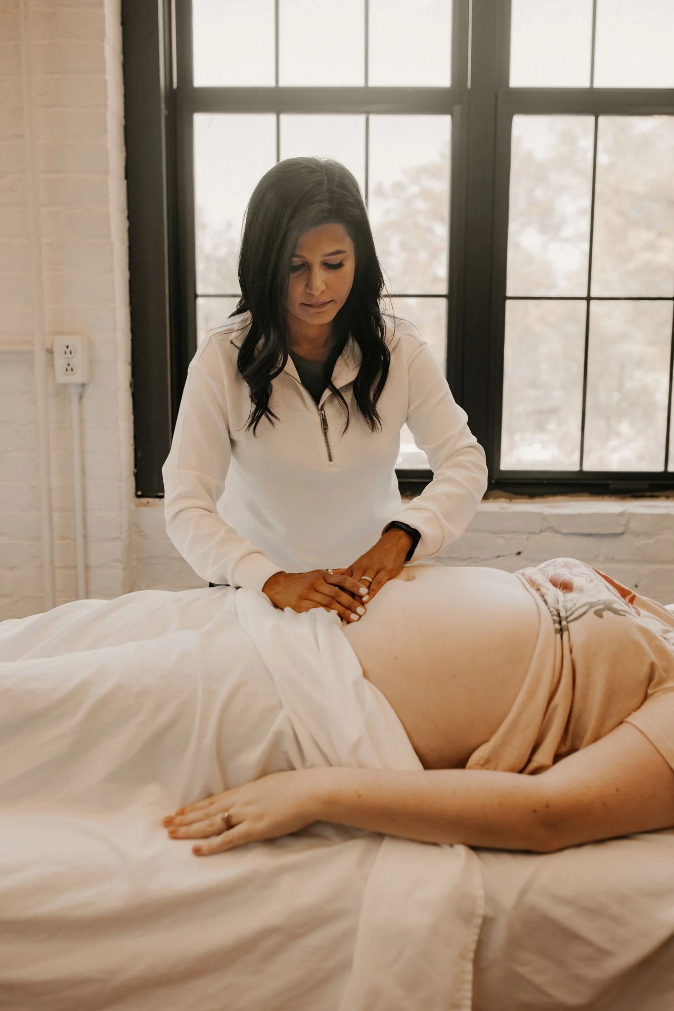 pelvic floor physical therapist palpates the core musculature