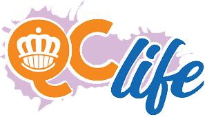 QC Life Logo with orange crown inside a circle, followed by the words 'QC' in orange and 'life' in blue, with purple paint splashes behind.