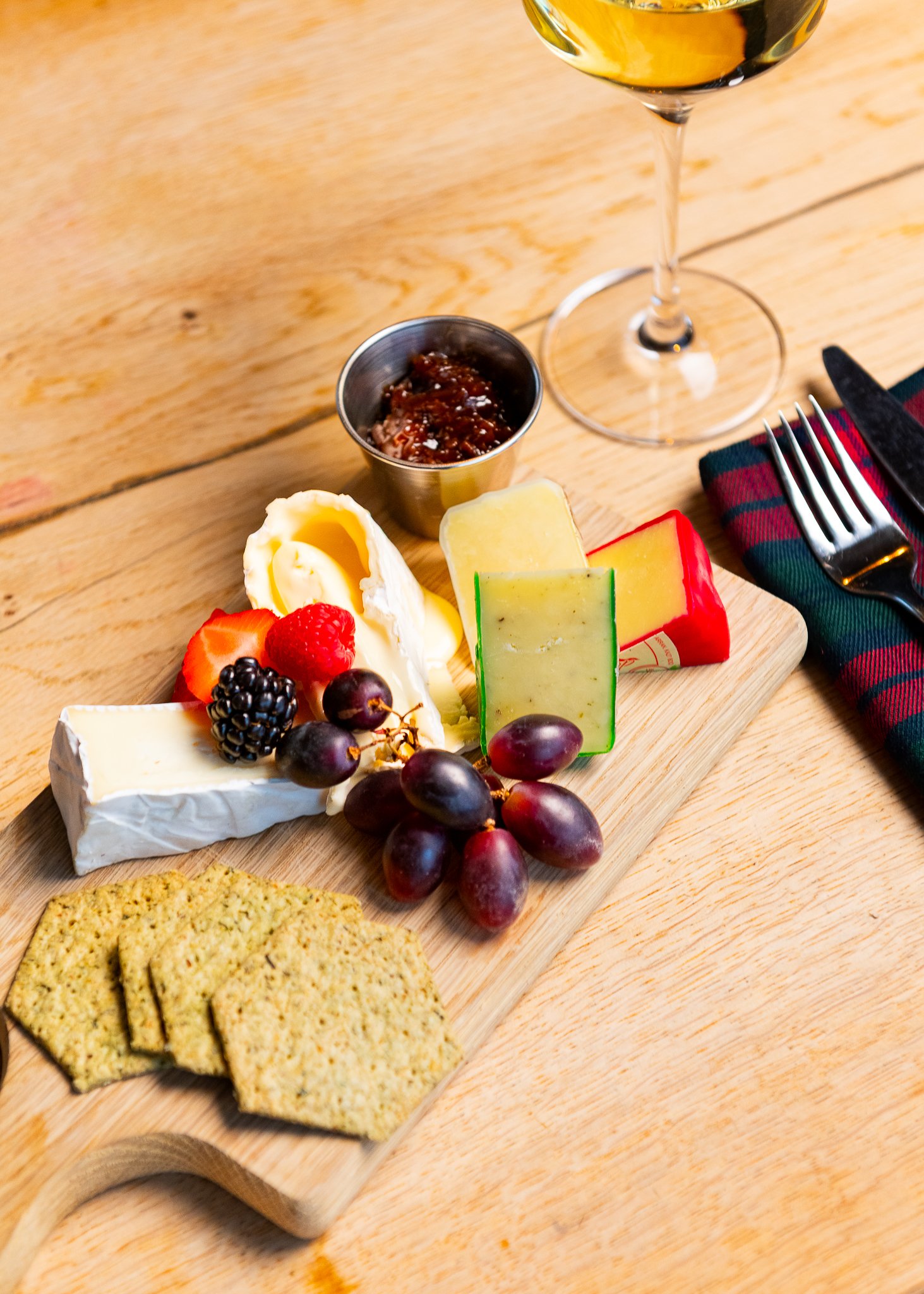 Karma Lake of Monteith Scottish cheese board with wine – hotel restaurant photographer Scotland