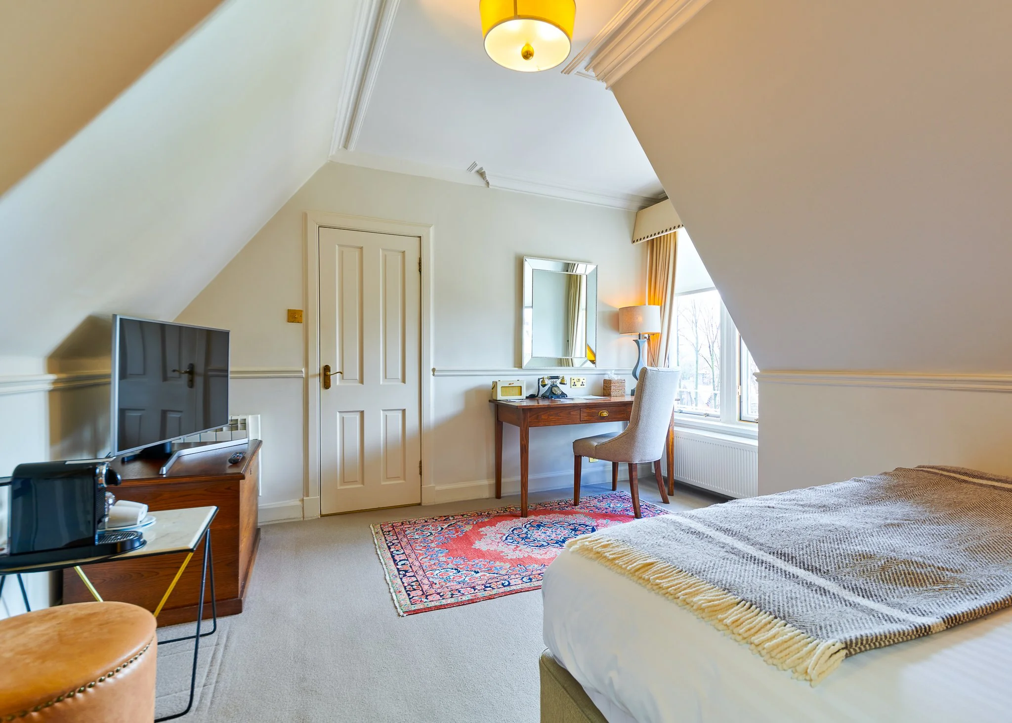 Roseate Edinburgh attic bedroom with dressing area – hotel interior photography Edinburgh