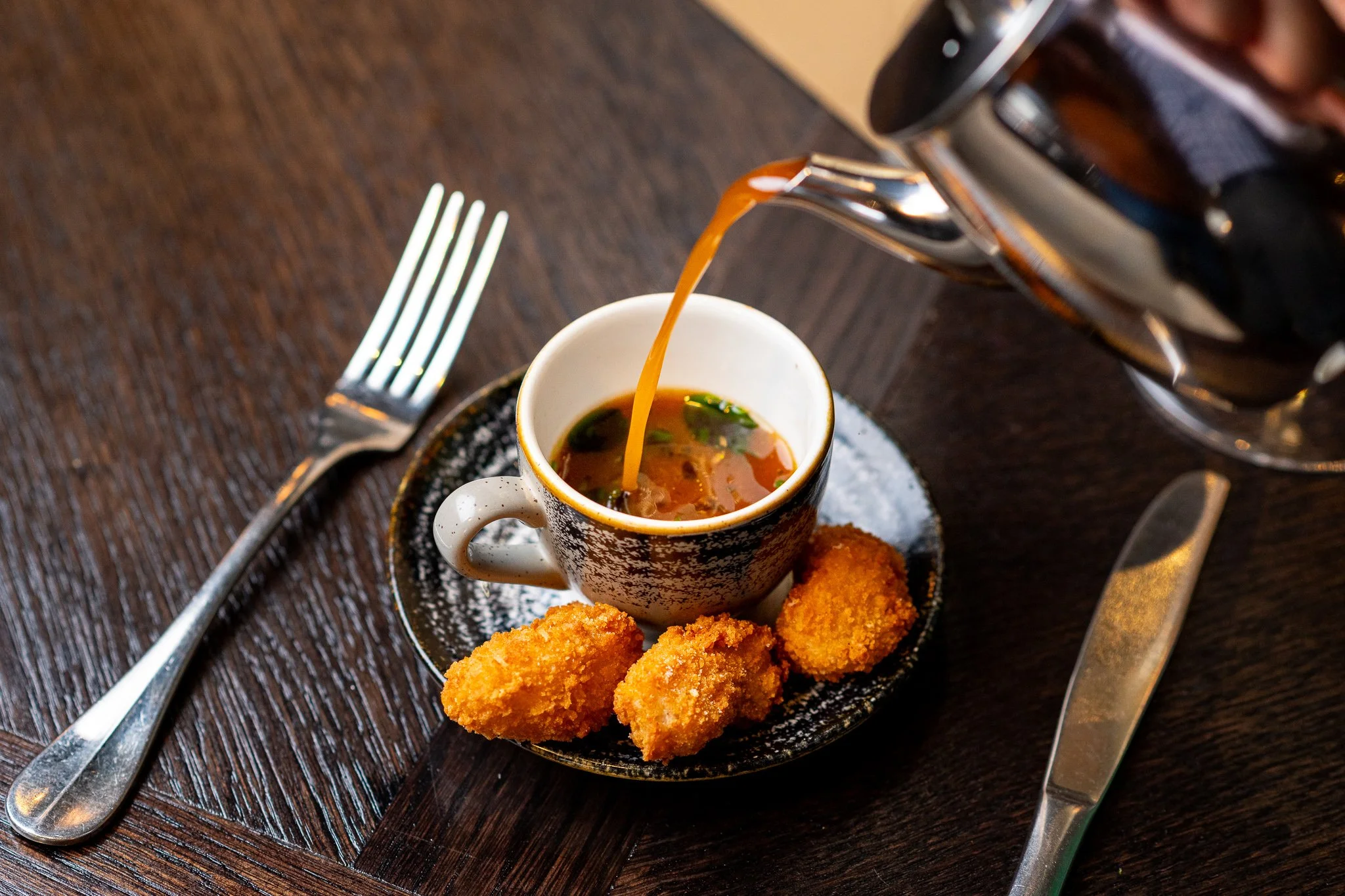 Glaschu Glasgow crispy prawns with sauce pour – food photography Glasgow Scotland