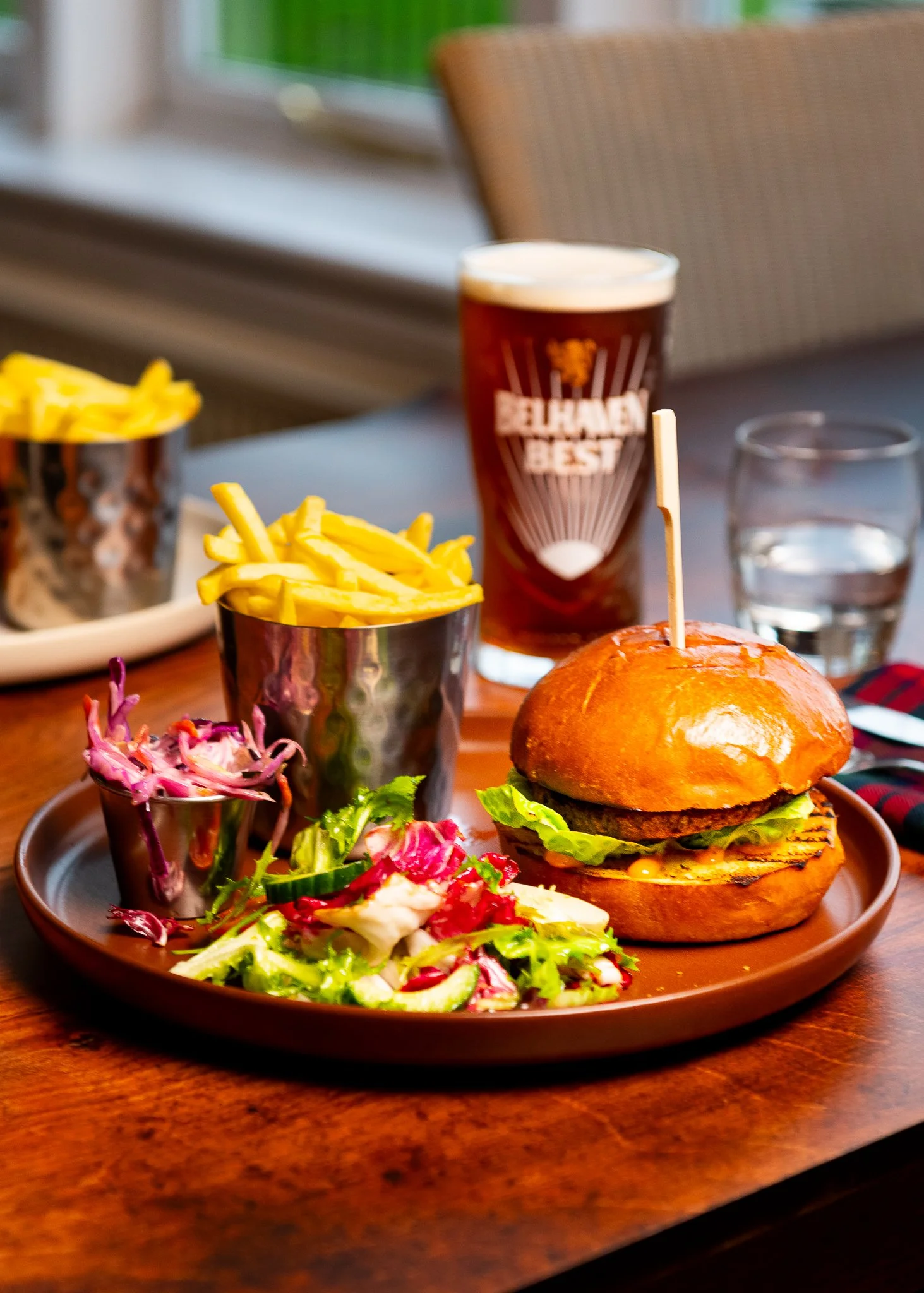 Karma Lake of Monteith burger with chips and beer – pub food photography Scotland