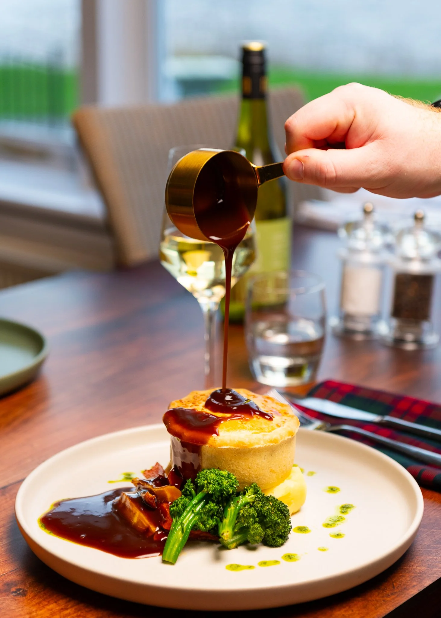 Karma Lake of Monteith sauce pour over meat – fine dining food photography Scotland