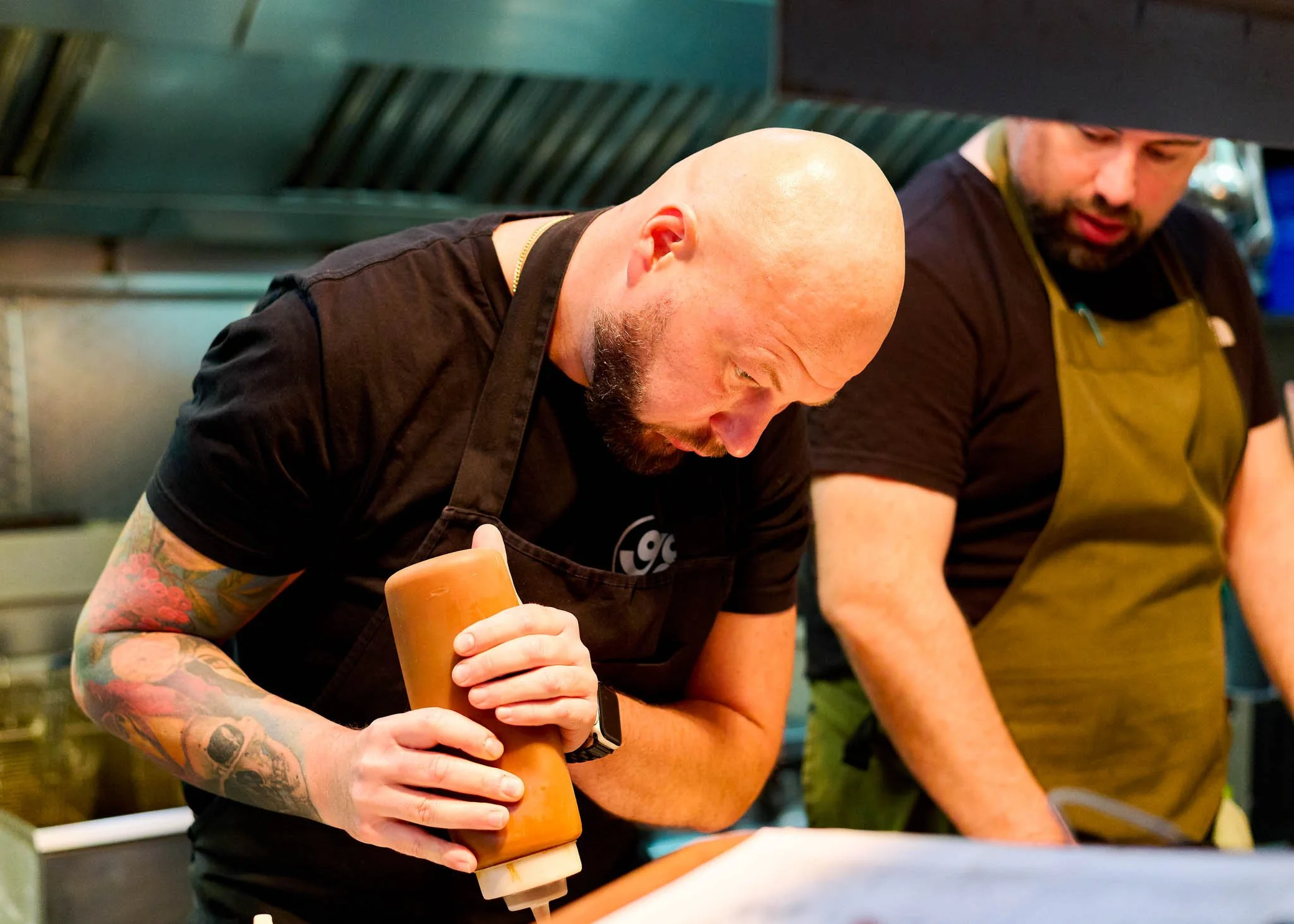 GaGa Glasgow chef plating dish in kitchen – hospitality photography Glasgow