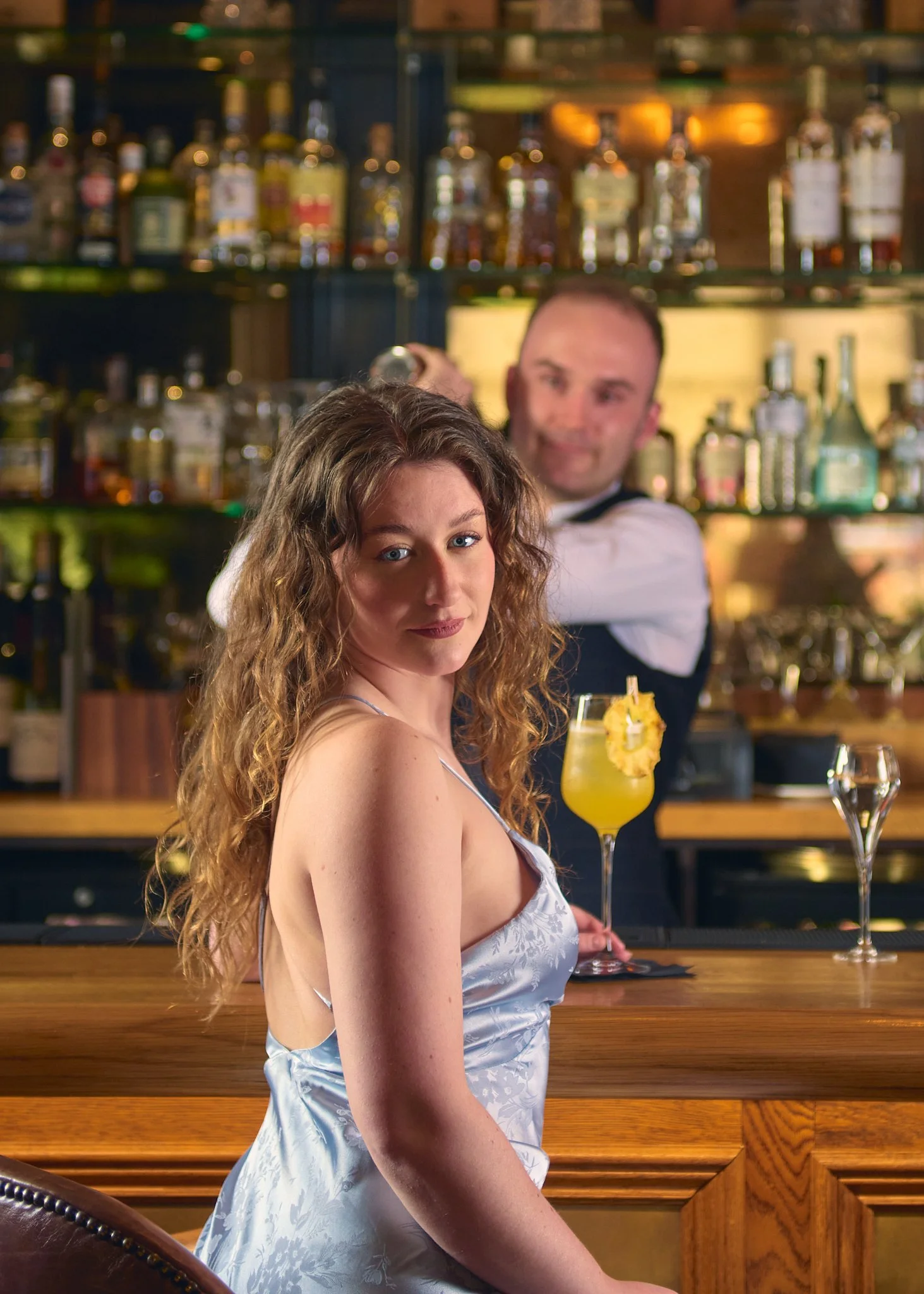 Roseate Edinburgh bar with bartender and guest – hotel bar photography Edinburgh