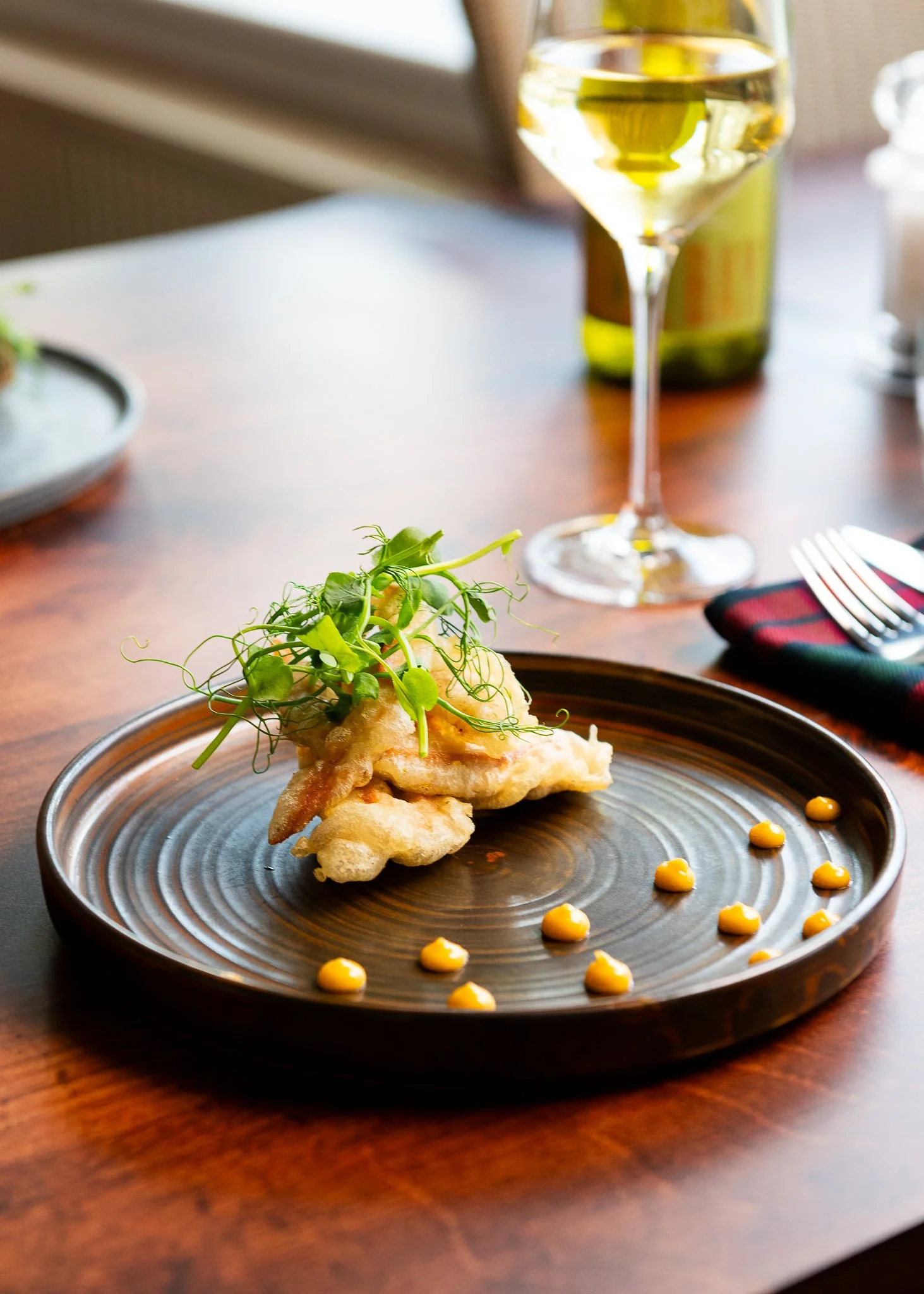 Karma Lake of Monteith fish dish with chickpeas – food photography Loch Lomond Scotland
