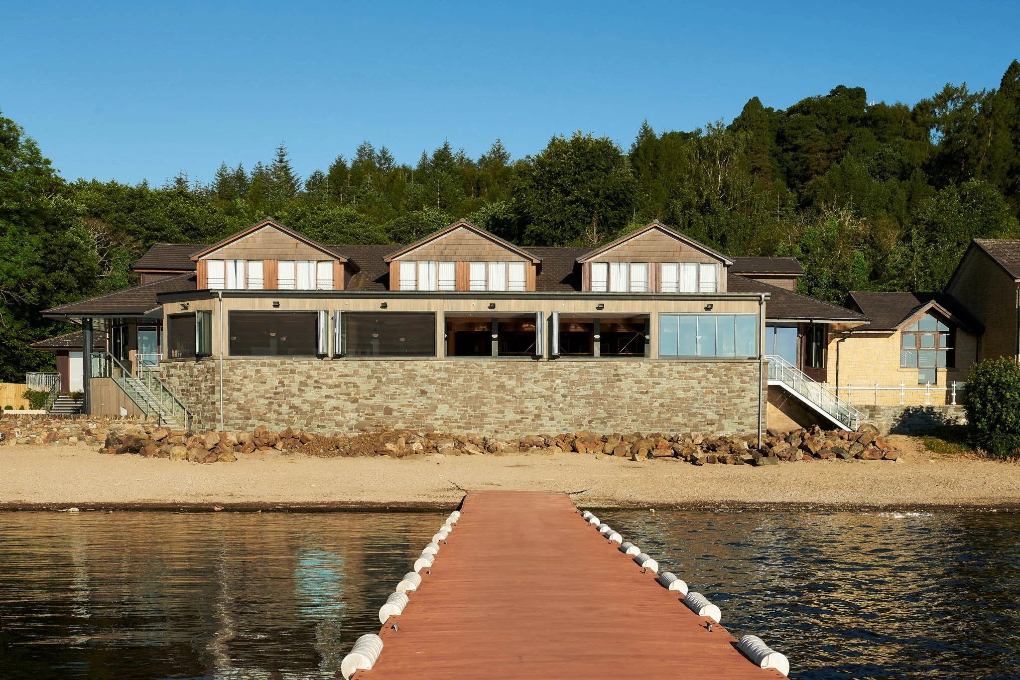 Lodge on Loch Lomond jetty and lochside cabins – hotel photographer Scotland