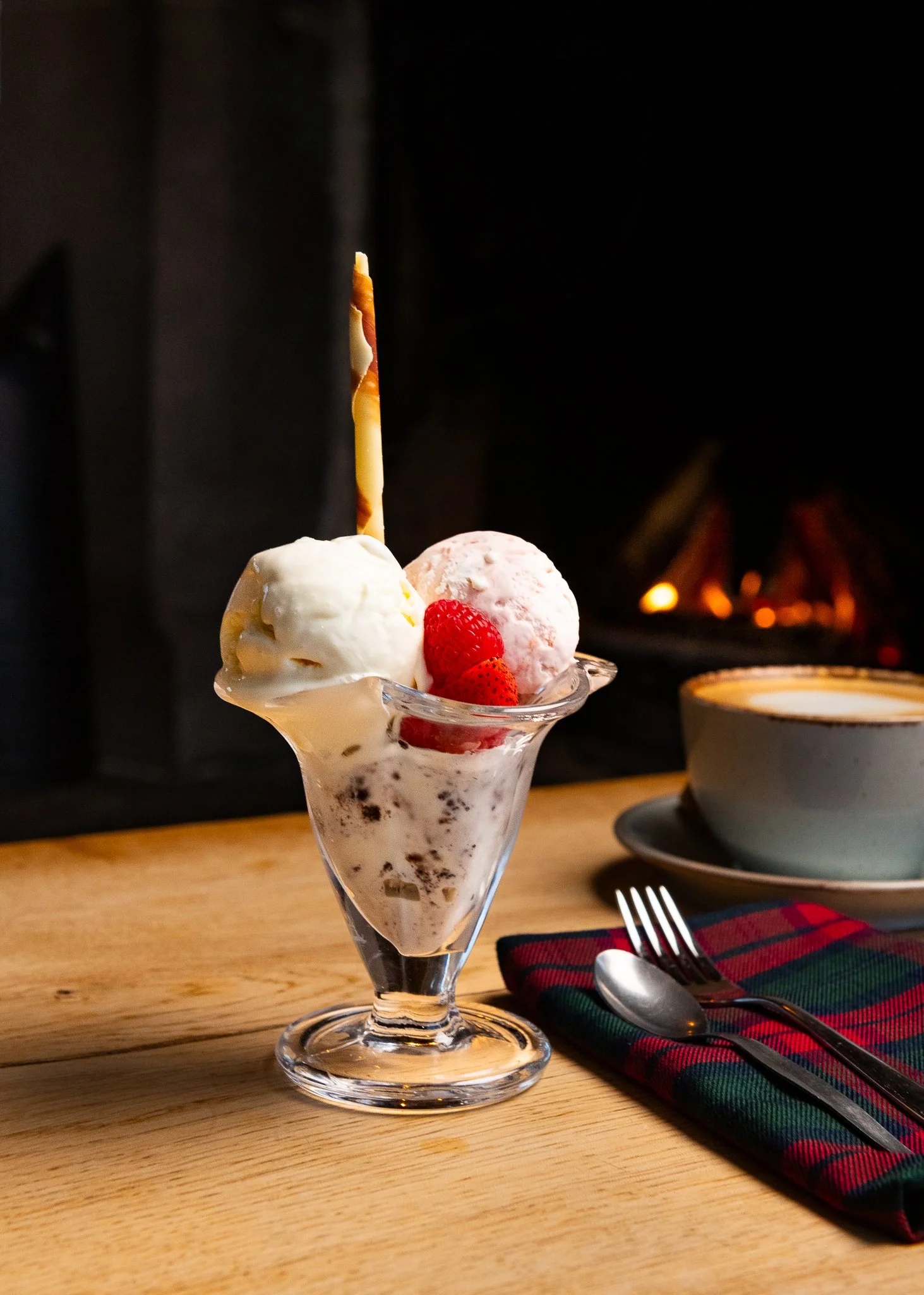 Karma Lake of Monteith ice cream sundae by fireplace – dessert food photography Scotland