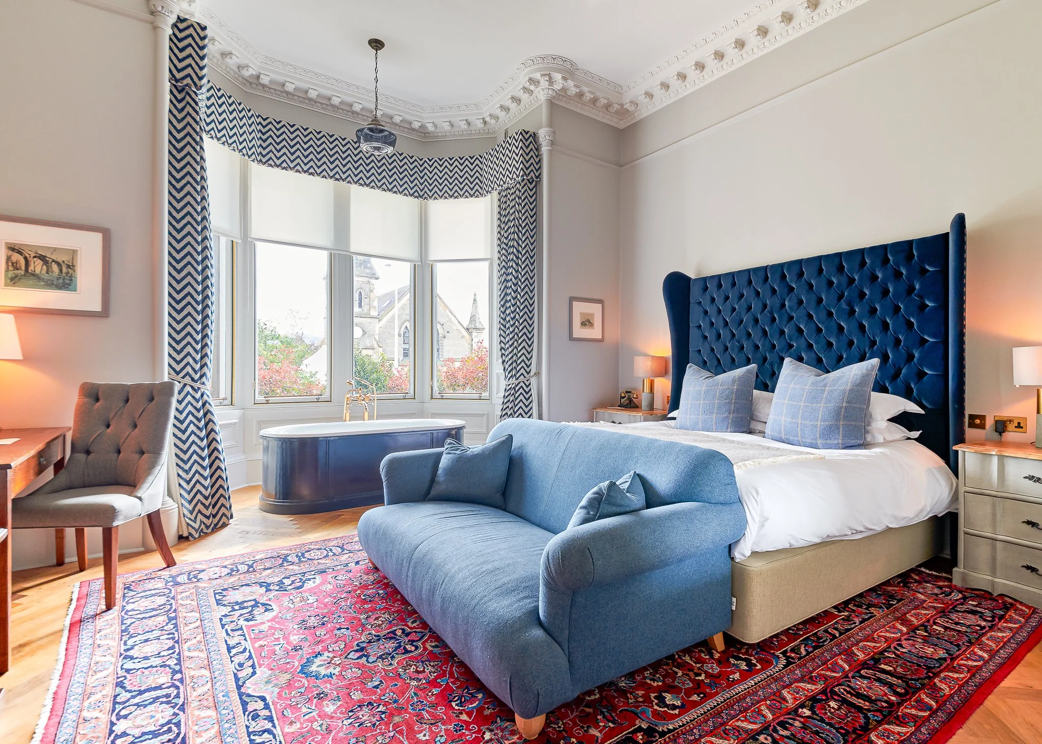 Roseate Edinburgh bedroom with sofa and period windows – boutique hotel photographer Edinburgh