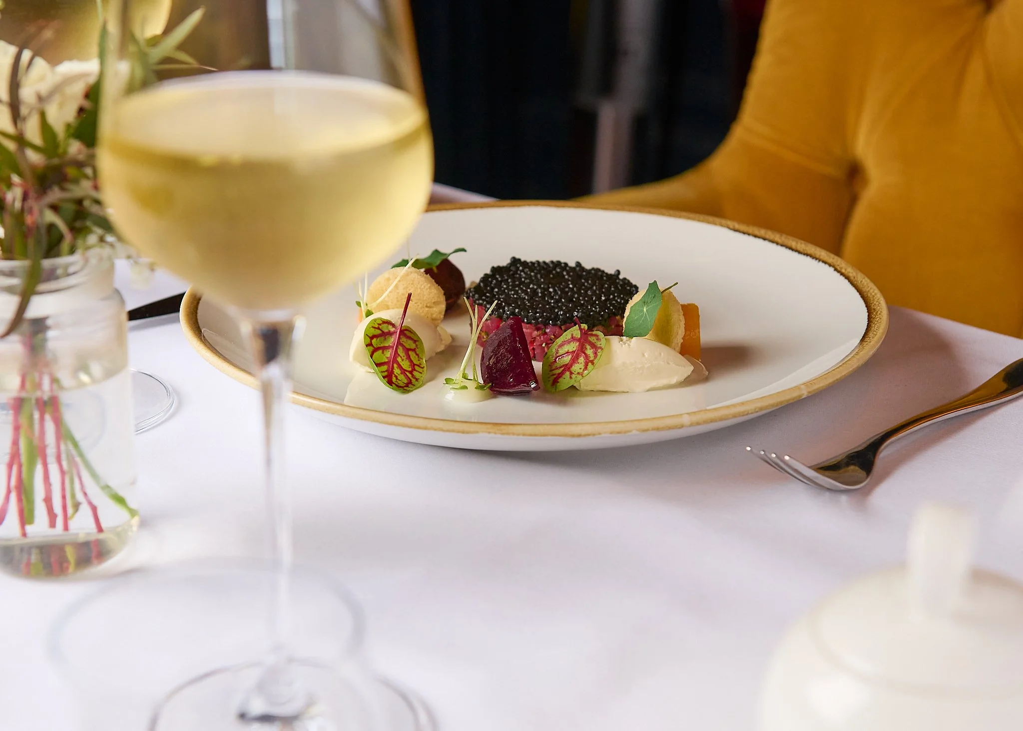 Roseate Edinburgh caviar dish with white wine – fine dining photography Edinburgh Scotland