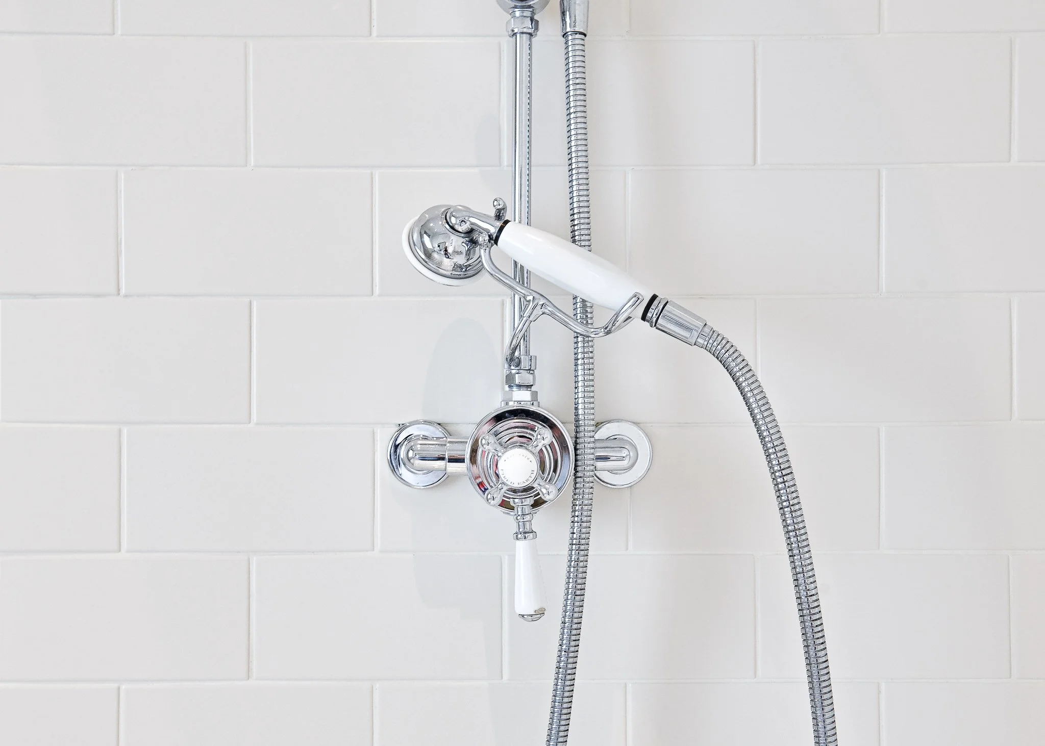 Roseate Edinburgh vintage shower fitting detail – boutique hotel bathroom photography Edinburgh