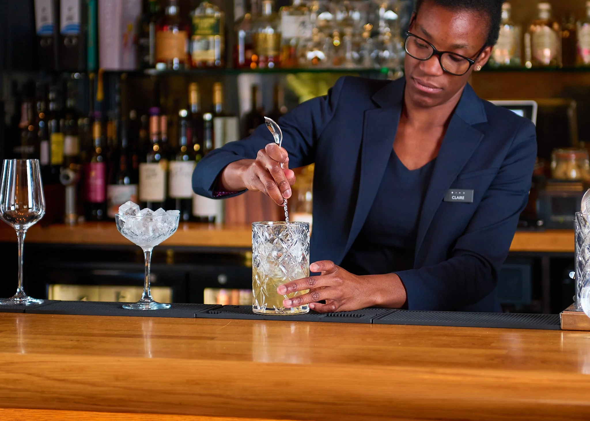 Roseate Edinburgh bartender preparing cocktail – hotel bar photography Edinburgh Scotland