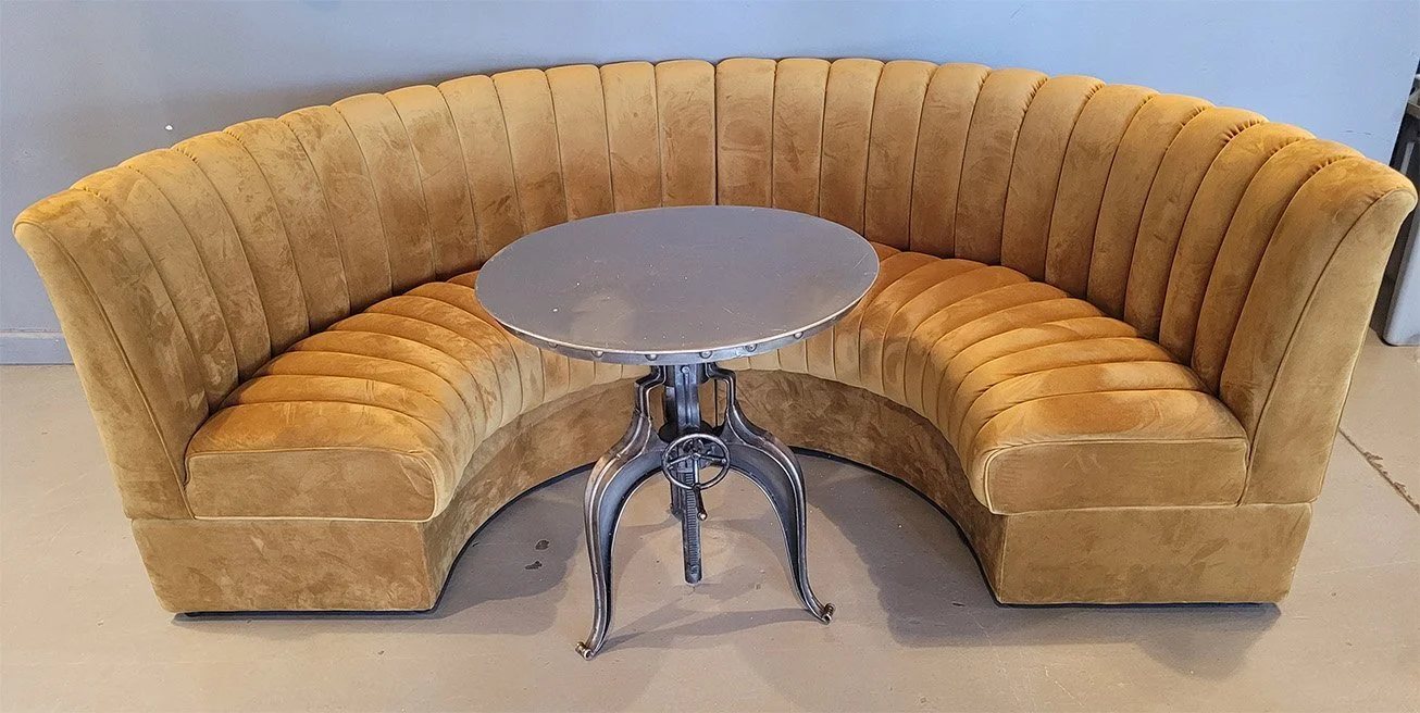 1 – large yellow curved sofas