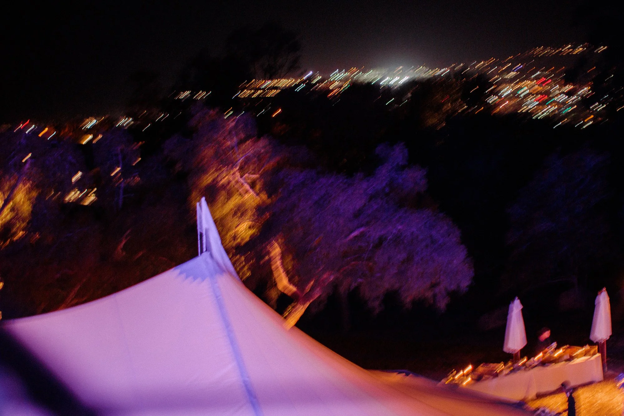 Cliffside nighttime view photographed by Michael & Anna Costa