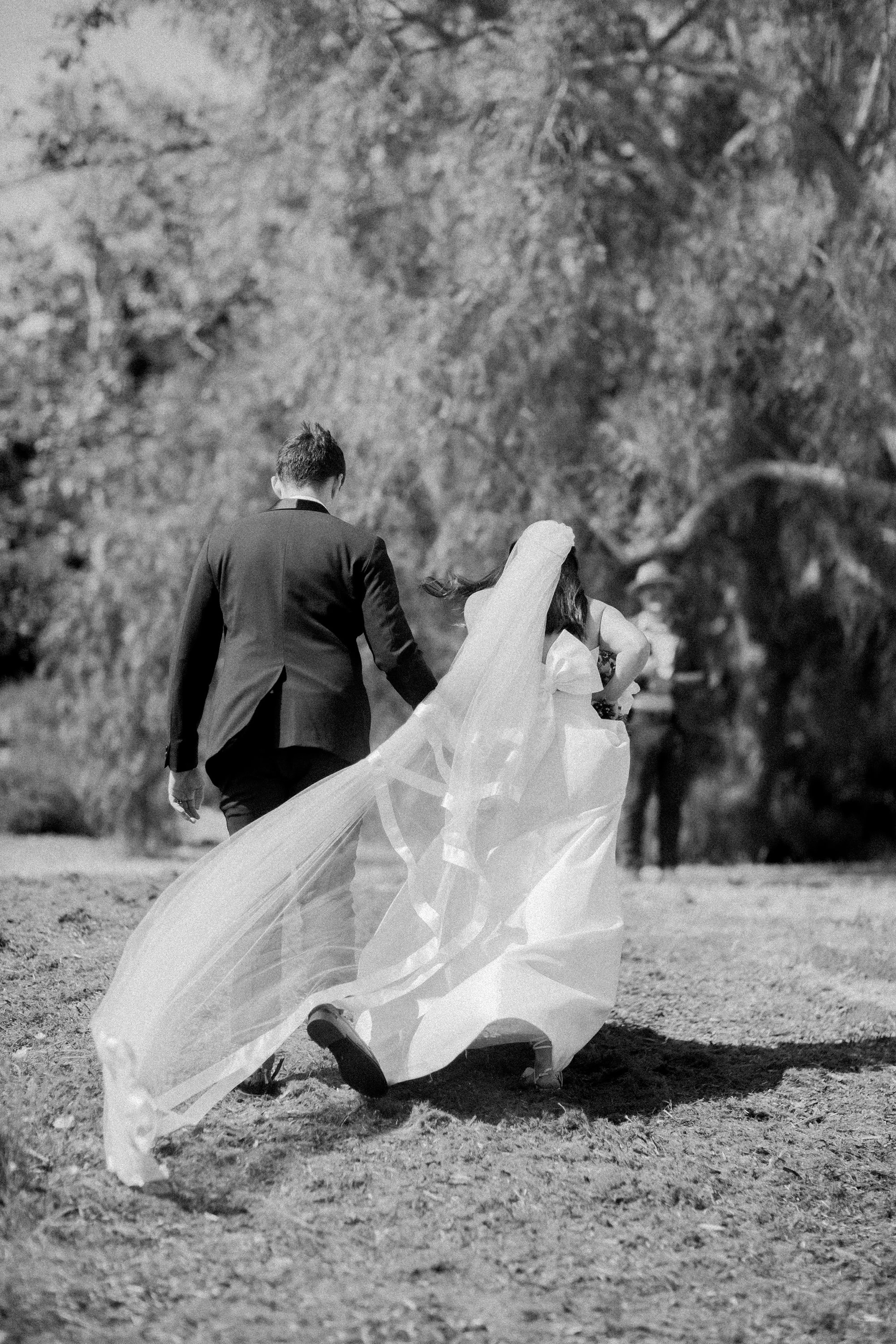 black and white photograph of bride and groom photographed by Michael and Anna Costa