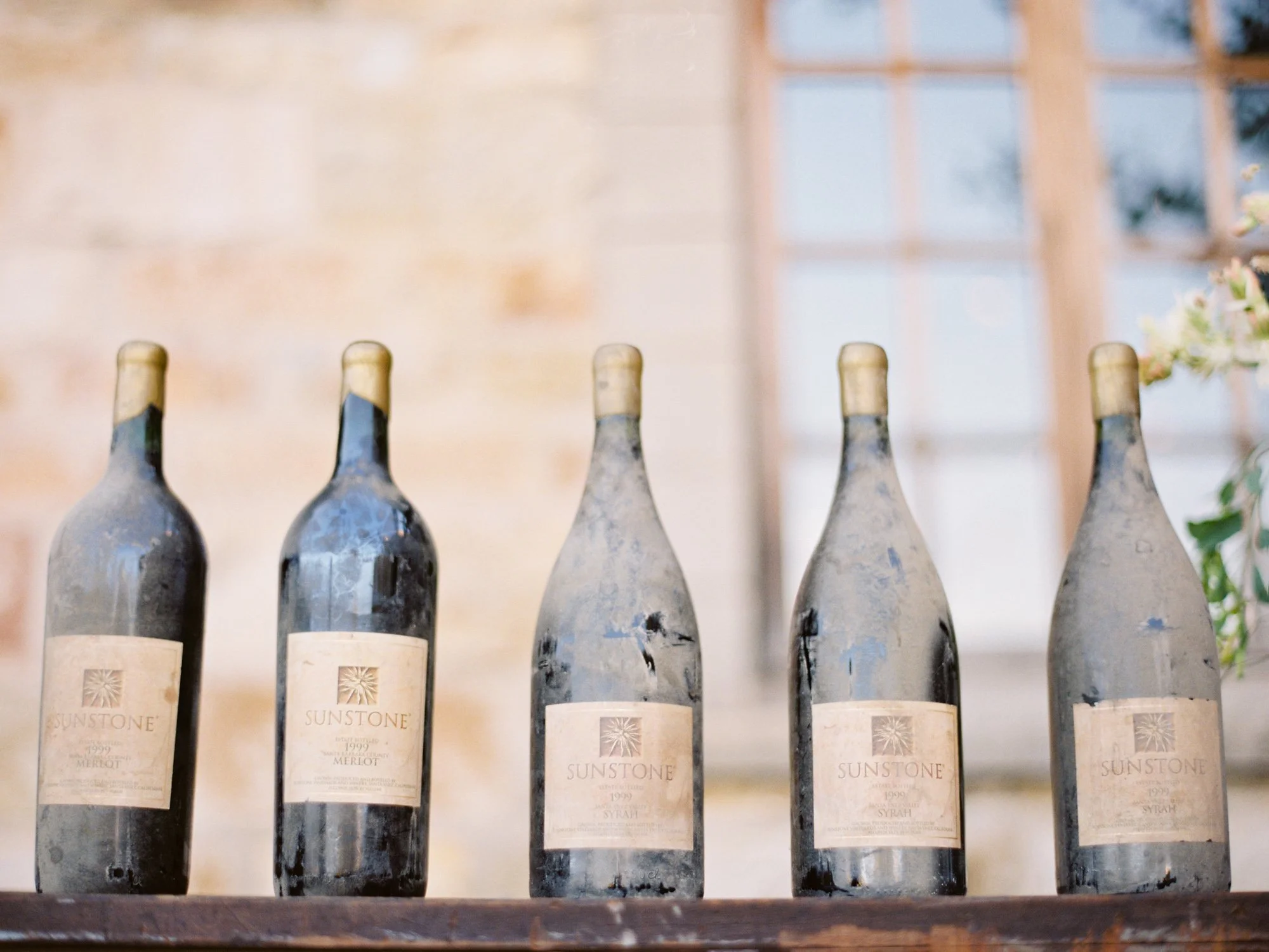 08-sunstone-winery-wine-bottle-lineup.jpg.JPG