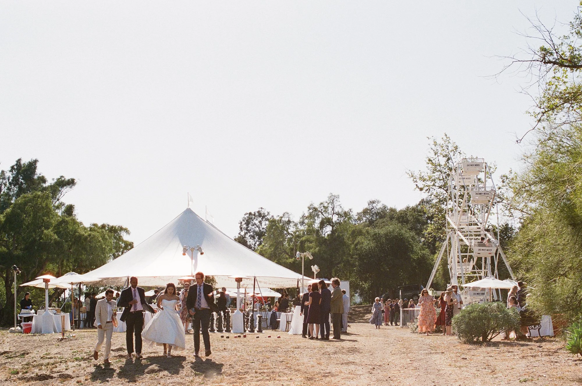 outdoor wedding reception photographed by Michael and Anna Costa