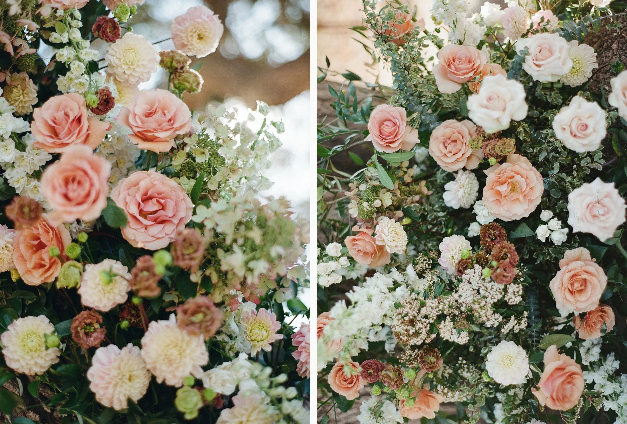 Close-up of pastel pink and white wedding floral arrangements.
