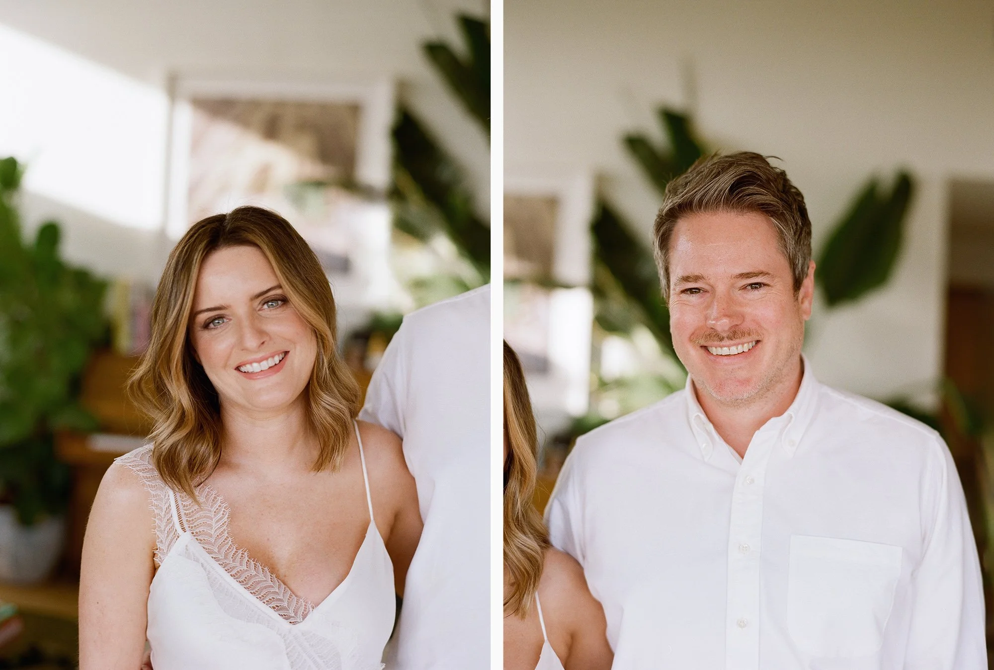 Couple smiling together outdoors, both dressed in white.