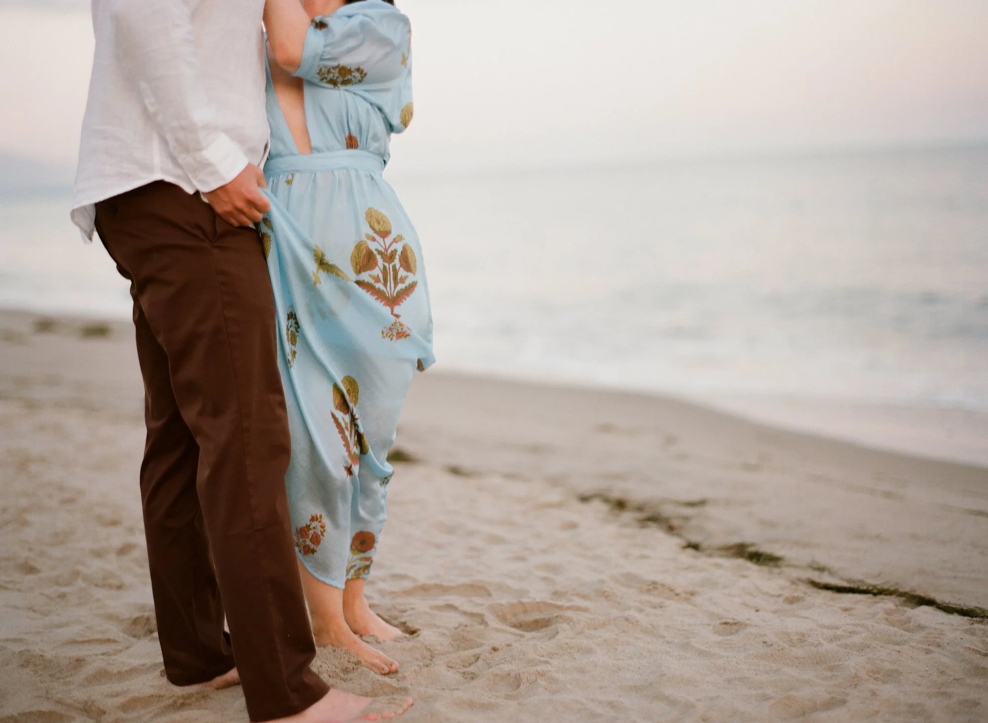 14-santa-barbara-engagement-couple-stairs-smiling.jpg.JPG