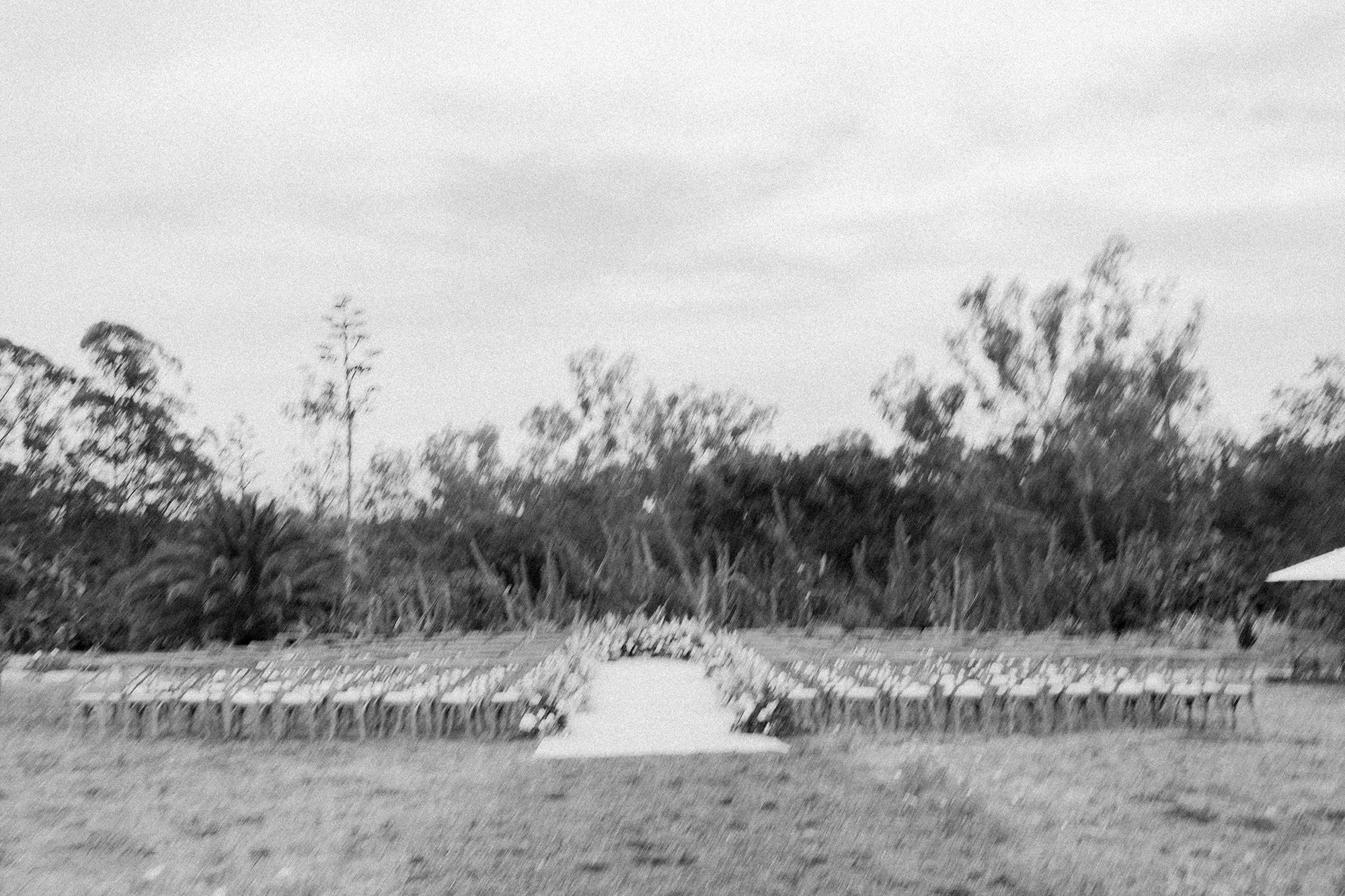 black and white outdoor wedding set up photographed by Michael and Anna Costa