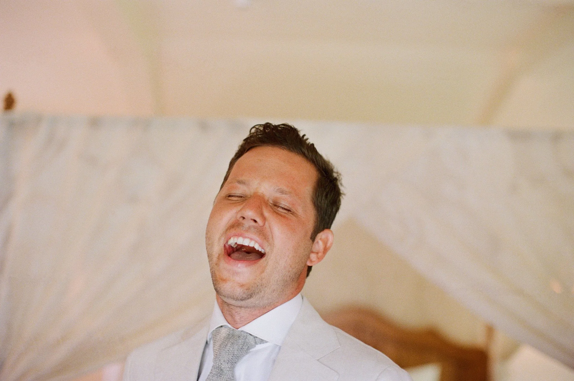 groom moments photographed by Michael and Anna Costa