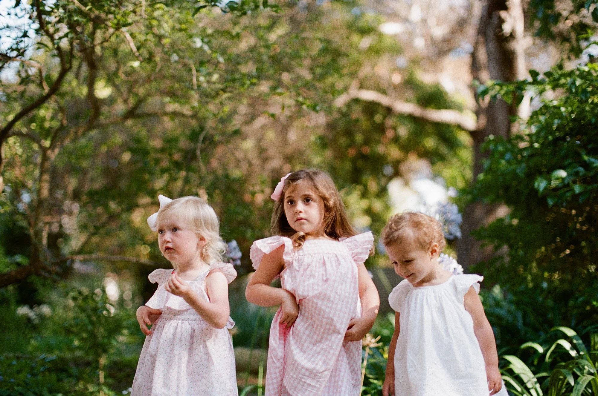07-epstein-family-children-holding-hands-garden.jpg.JPG