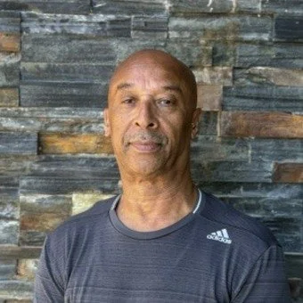 man in a grey shirt