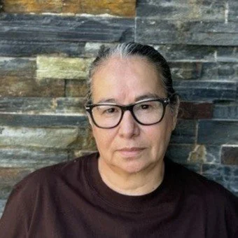 women in a brown shirt