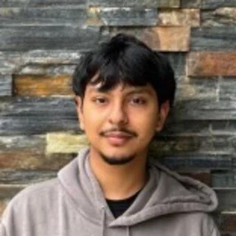 Young man in a grey sweatshirt