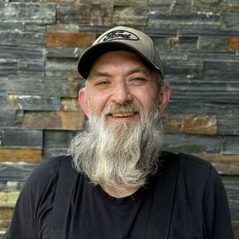 man with a beard and hat