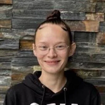woman in a black sweatshirt