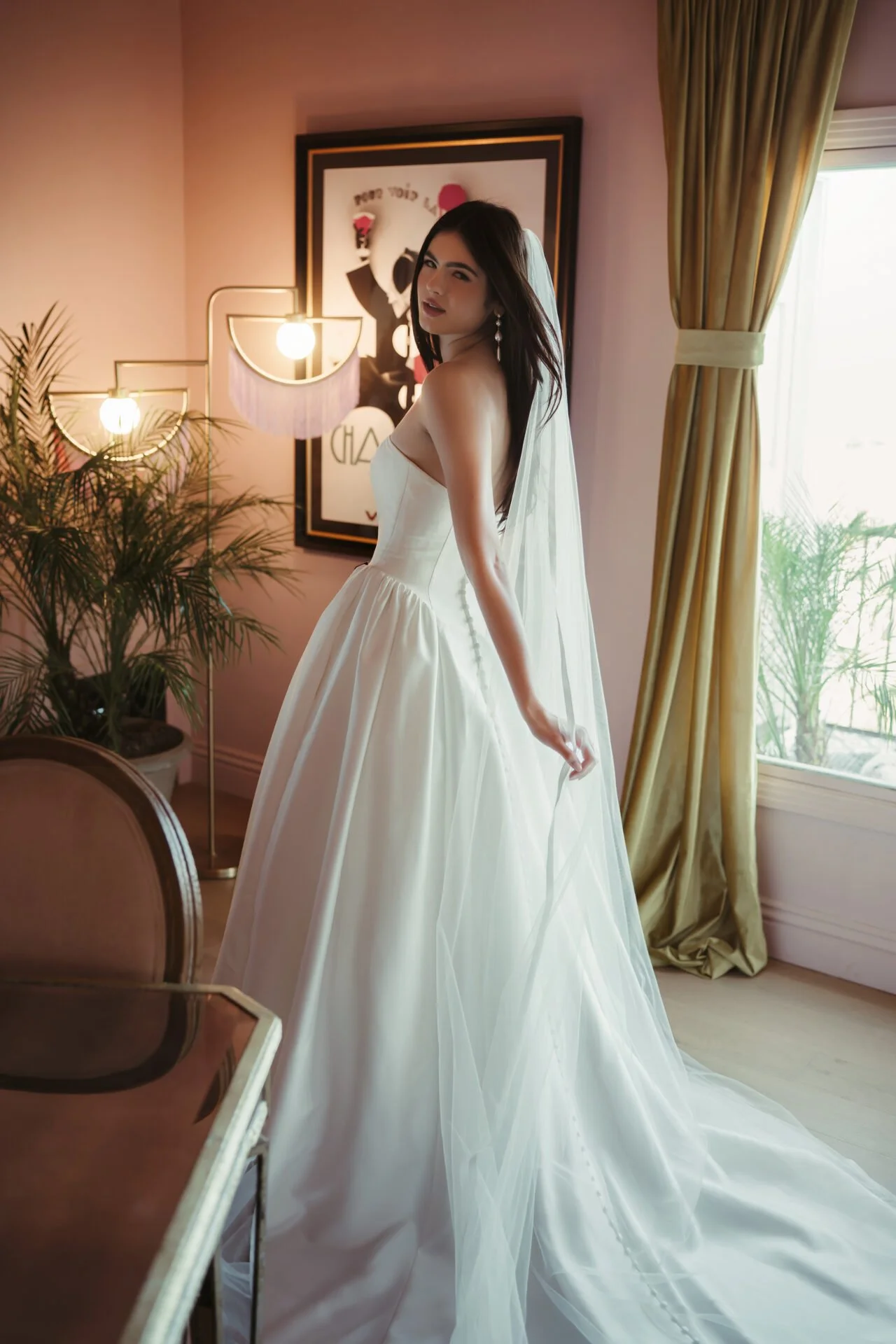 Stella York satin ball gown with infinity waistline and accentuated hips. Available in Lake Wales, Florida.