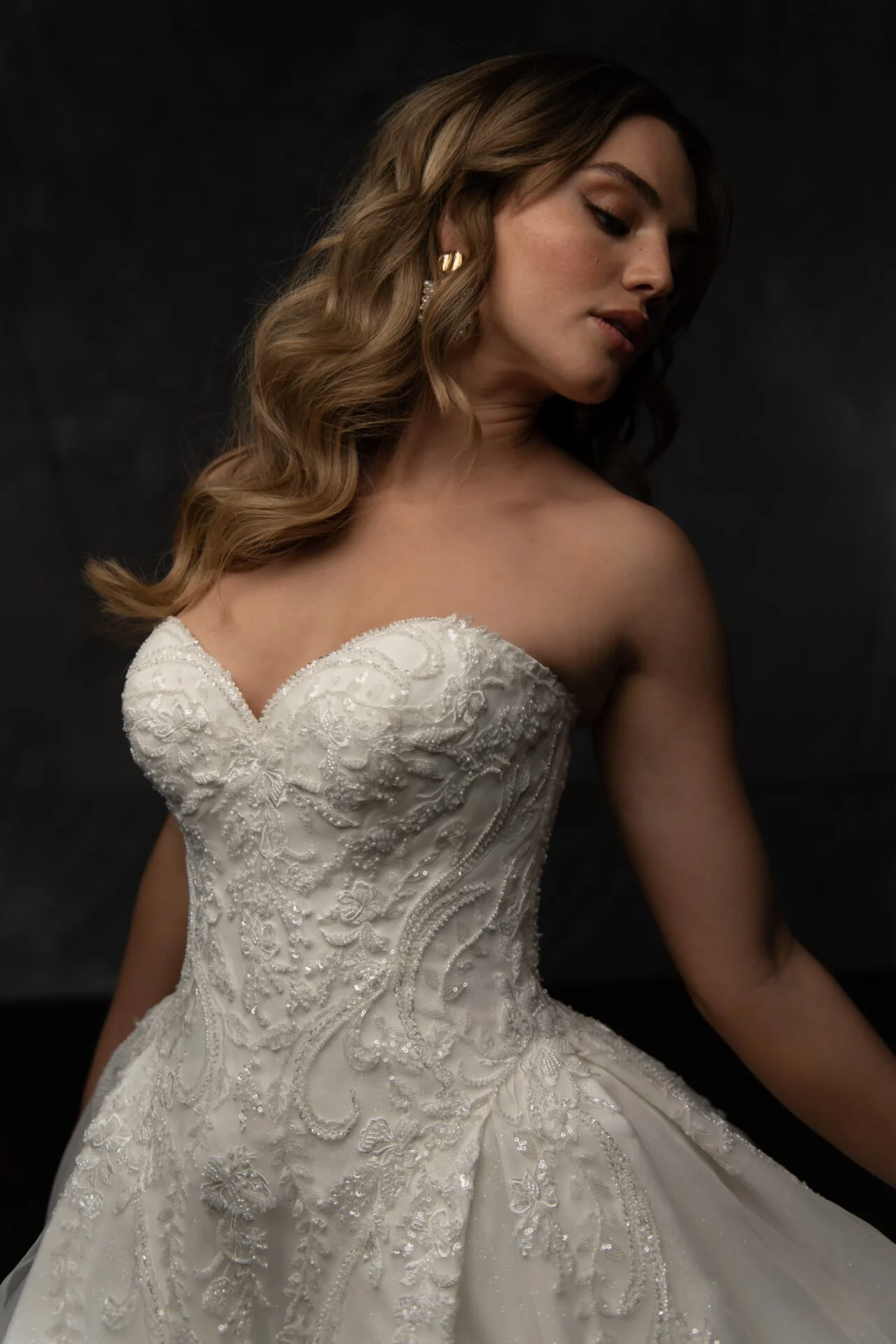 Fully beaded Essense of Australia ball gown with glitter tulle underlay and sweetheart neckline.
